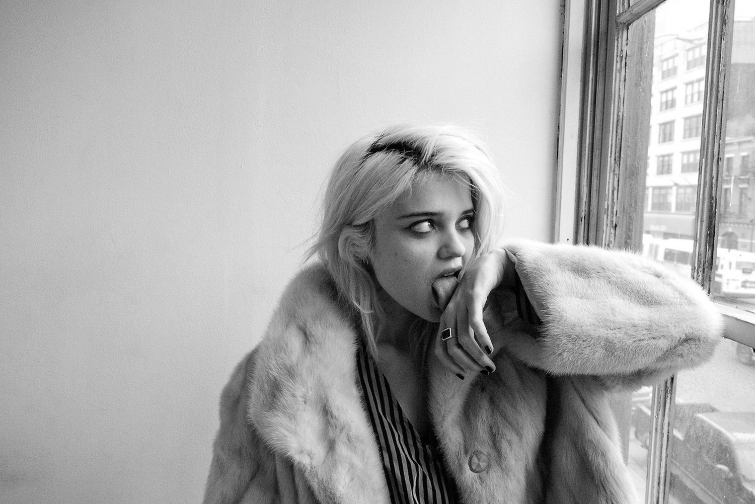 Sky Ferreira in a fur coat by the window HD Wallpaper