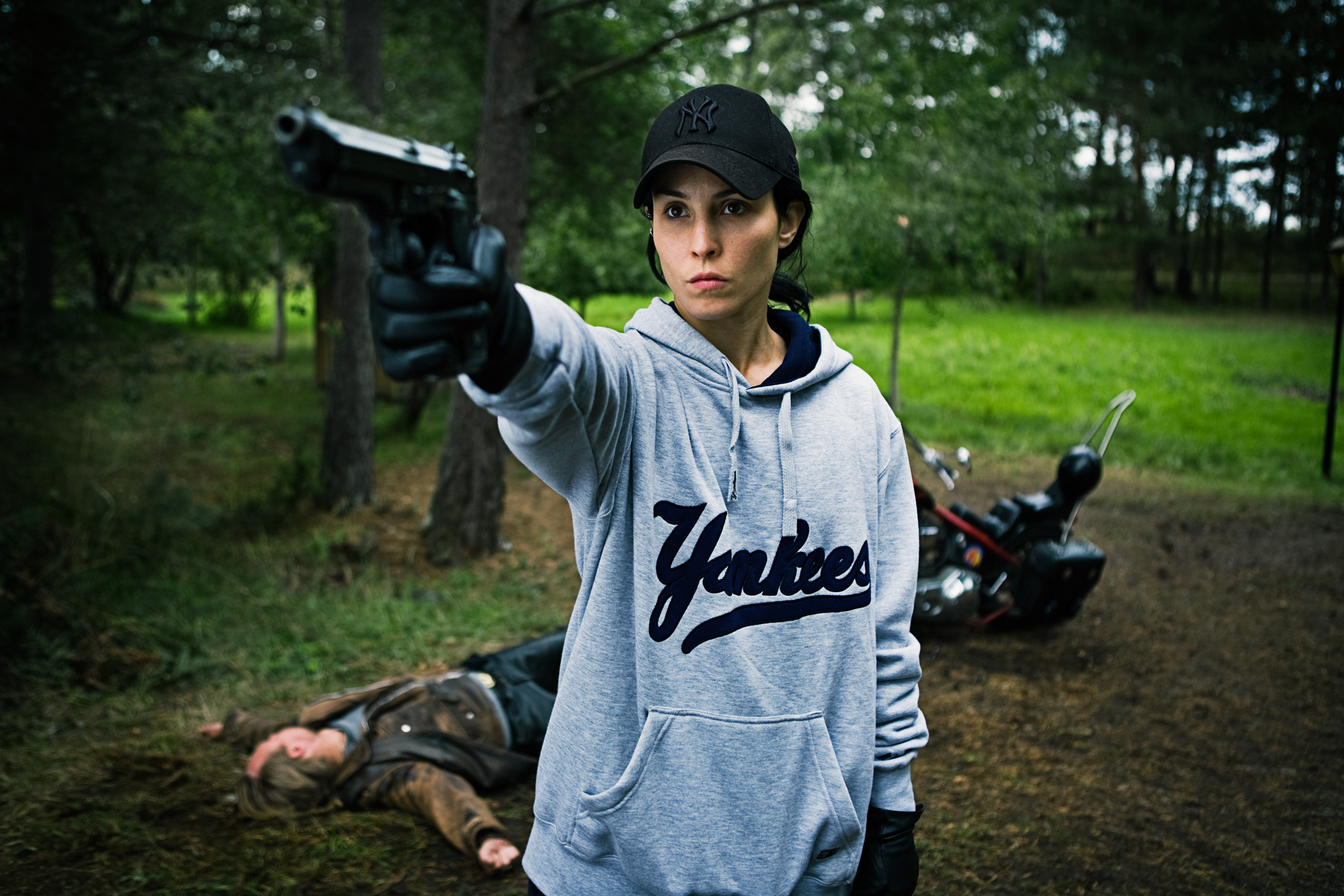 Noomi Rapace with Gun HD Wallpaper