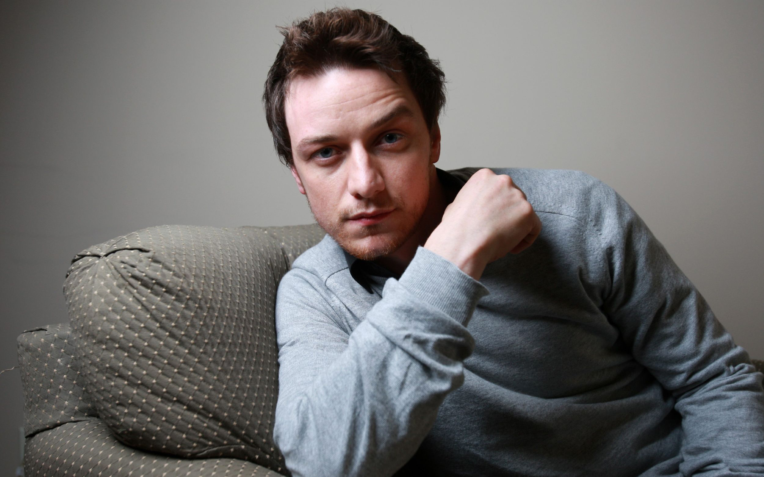James McAvoy sitting on a couch HD Wallpaper