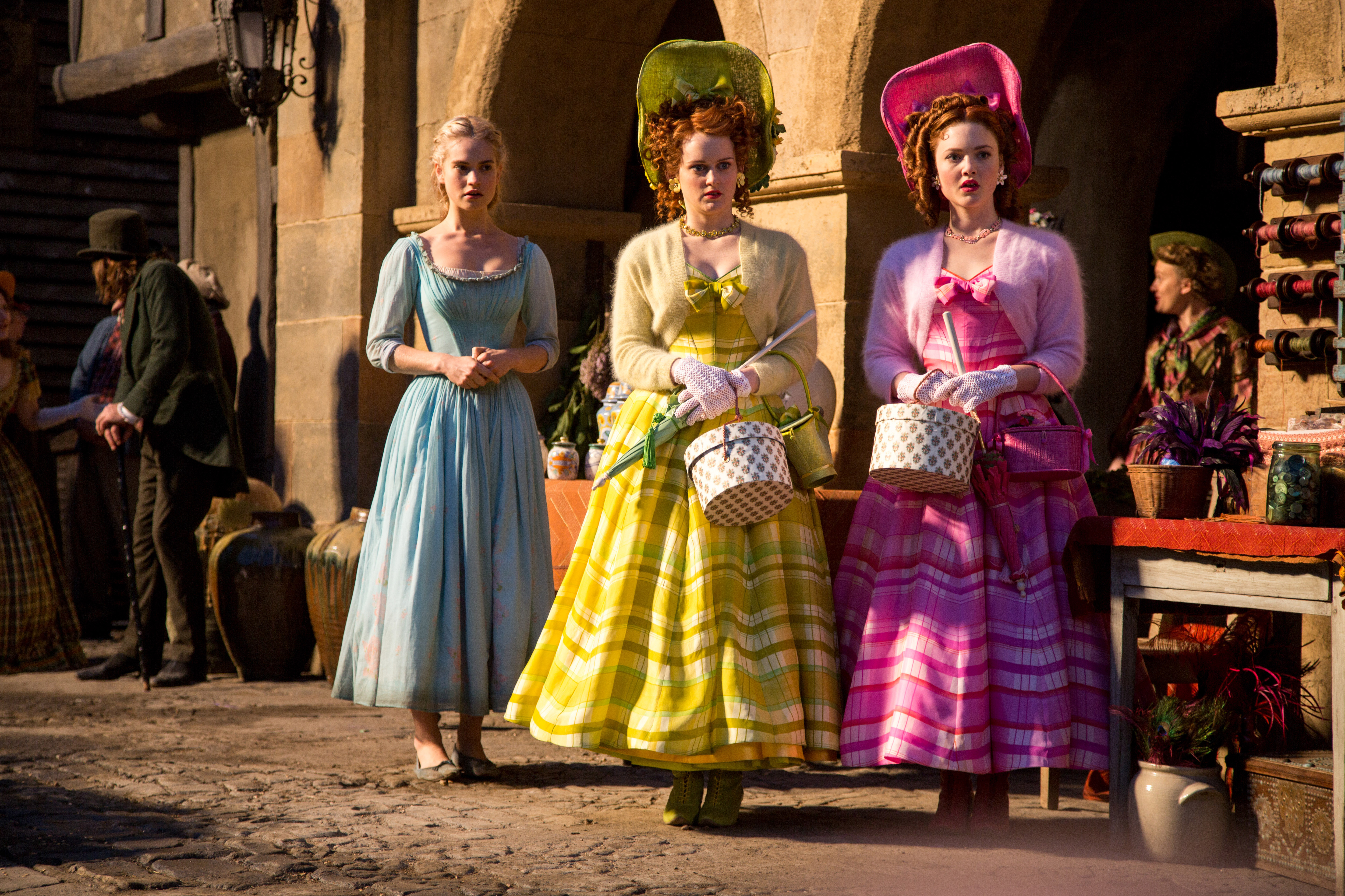 Cinderella and her stepsisters in colorful dresses HD Wallpaper