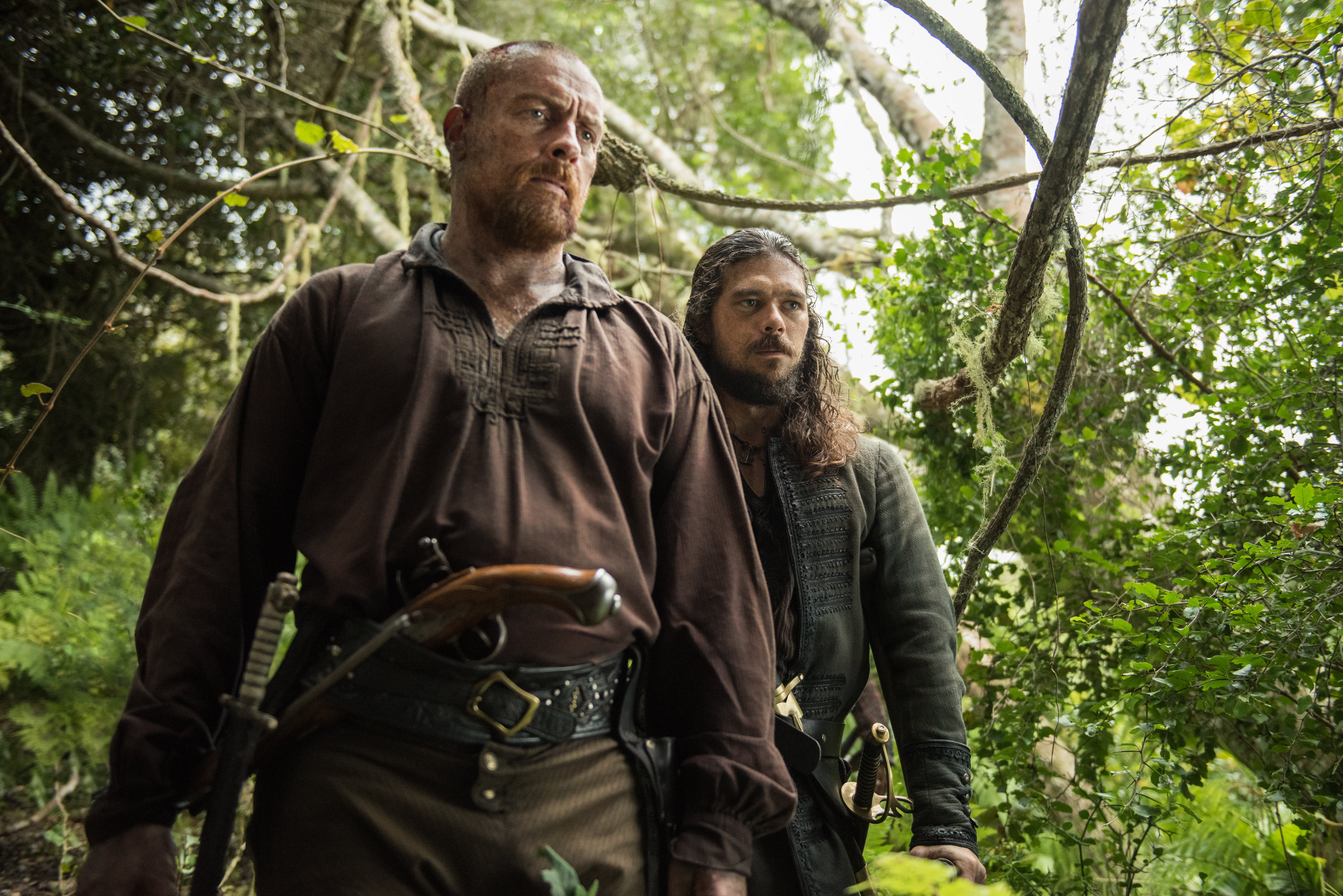 Luke Arnold in a forest HD Wallpaper