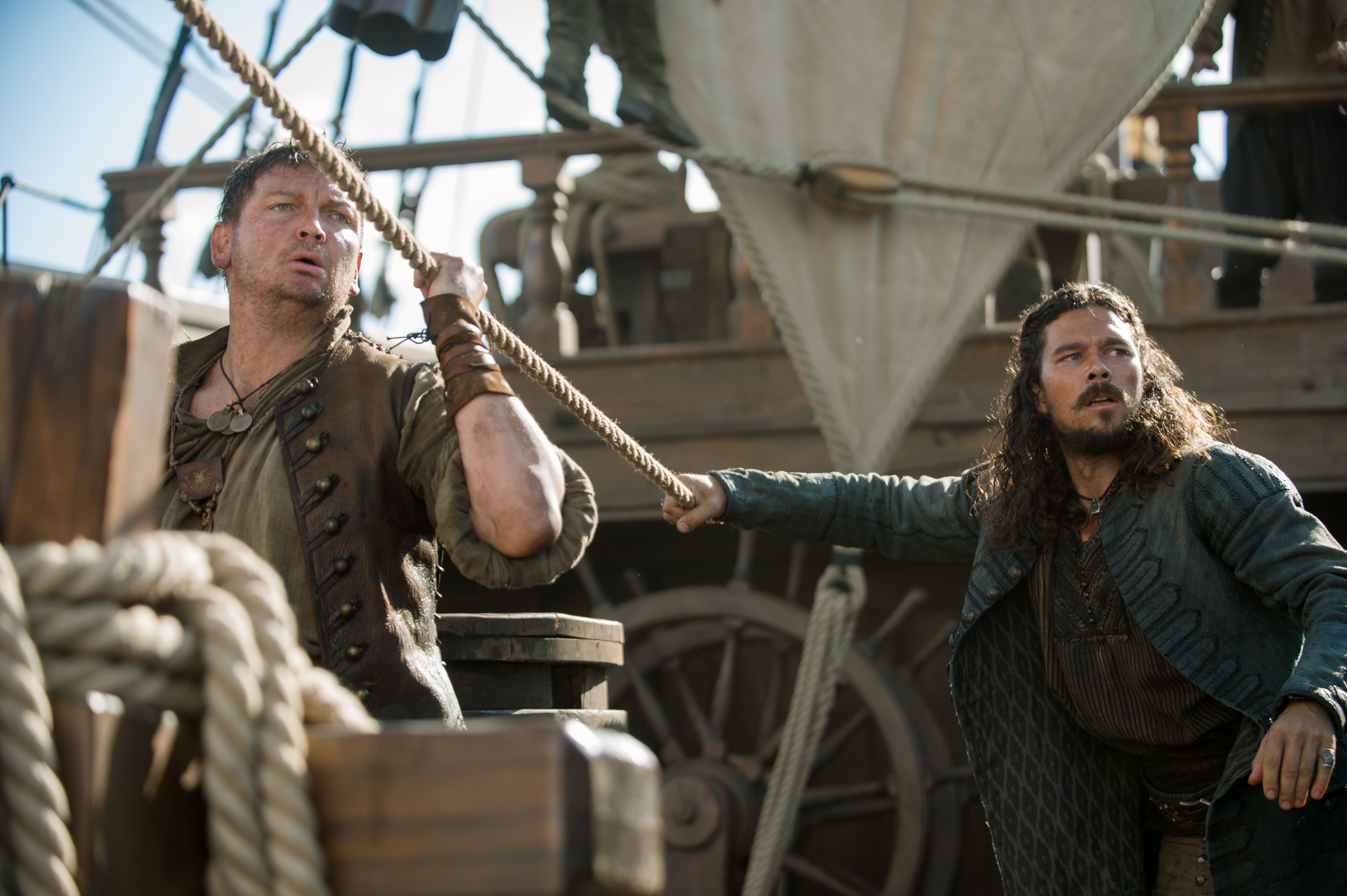 Two men on a ship pulling a rope HD Wallpaper