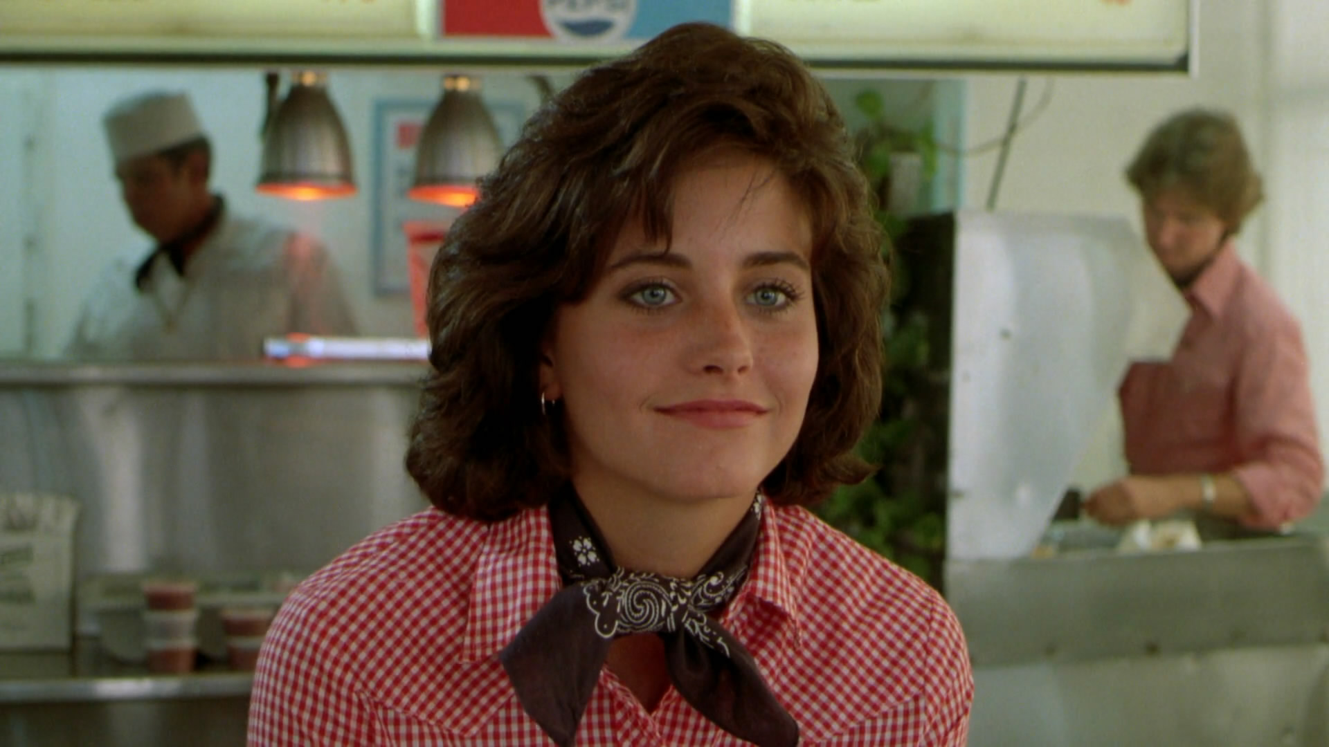 Courteney Cox in a diner HD Wallpaper