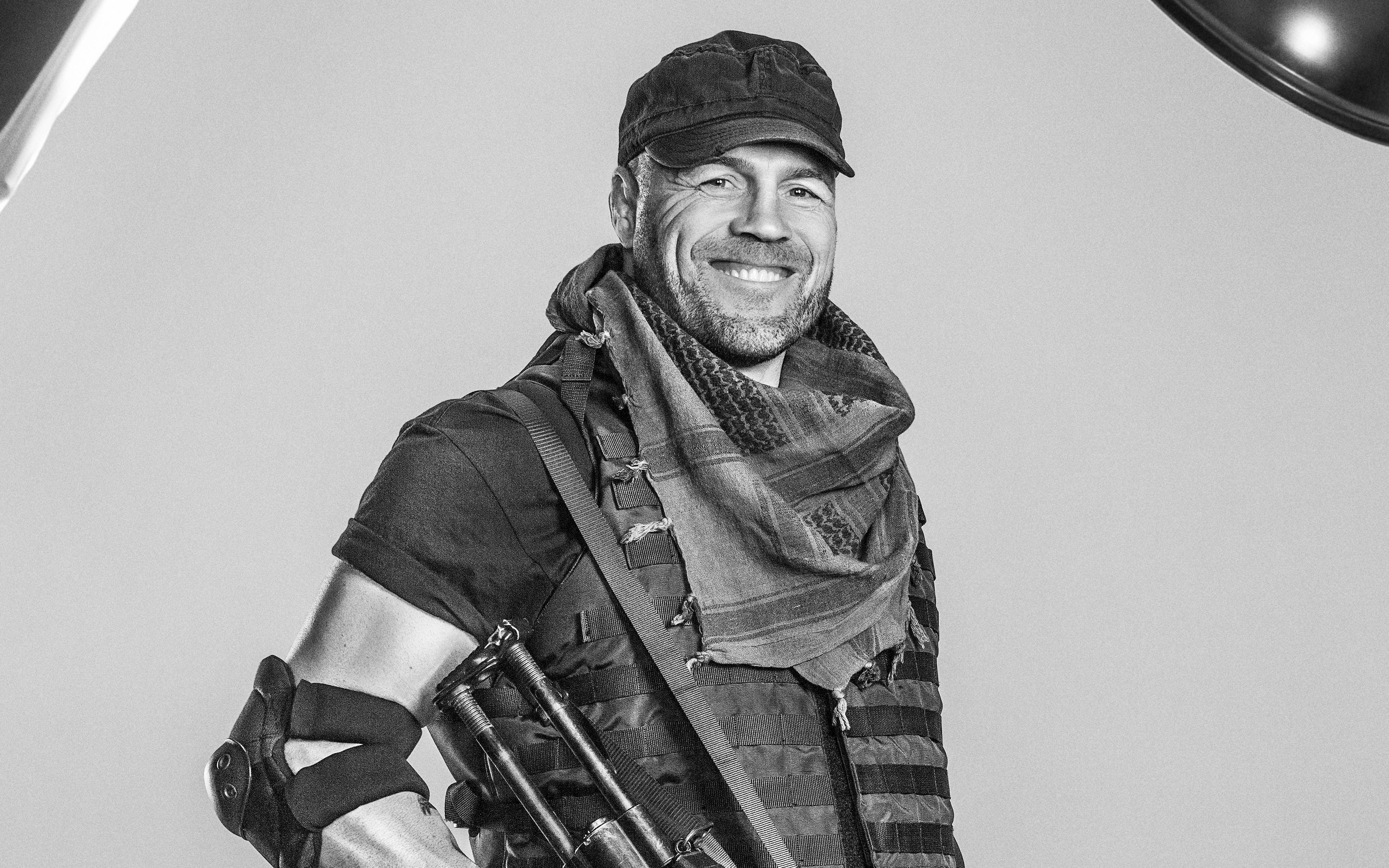 Randy Couture in tactical gear with rifle HD Wallpaper