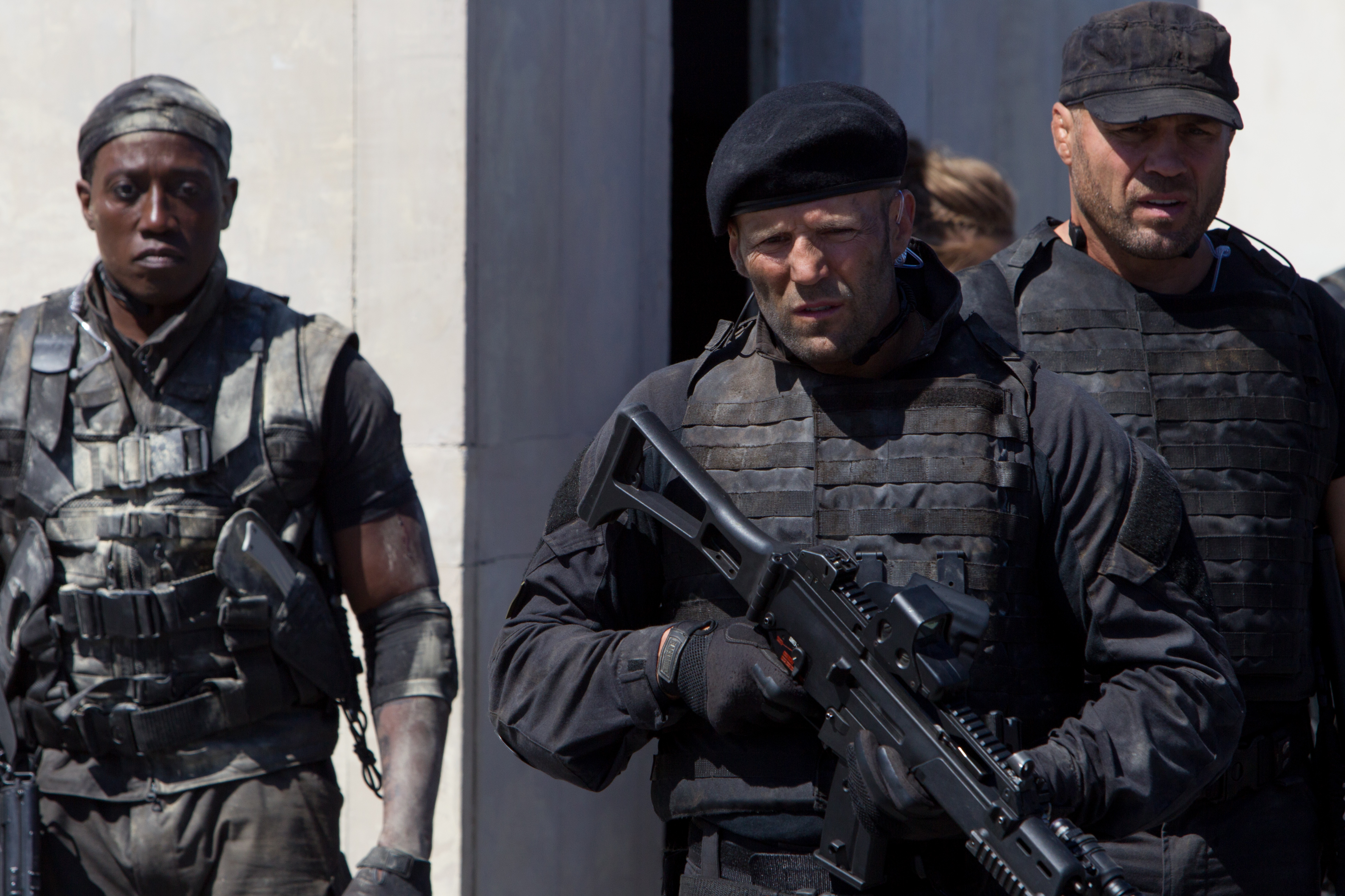 Randy Couture and Jason Statham in tactical gear HD Wallpaper
