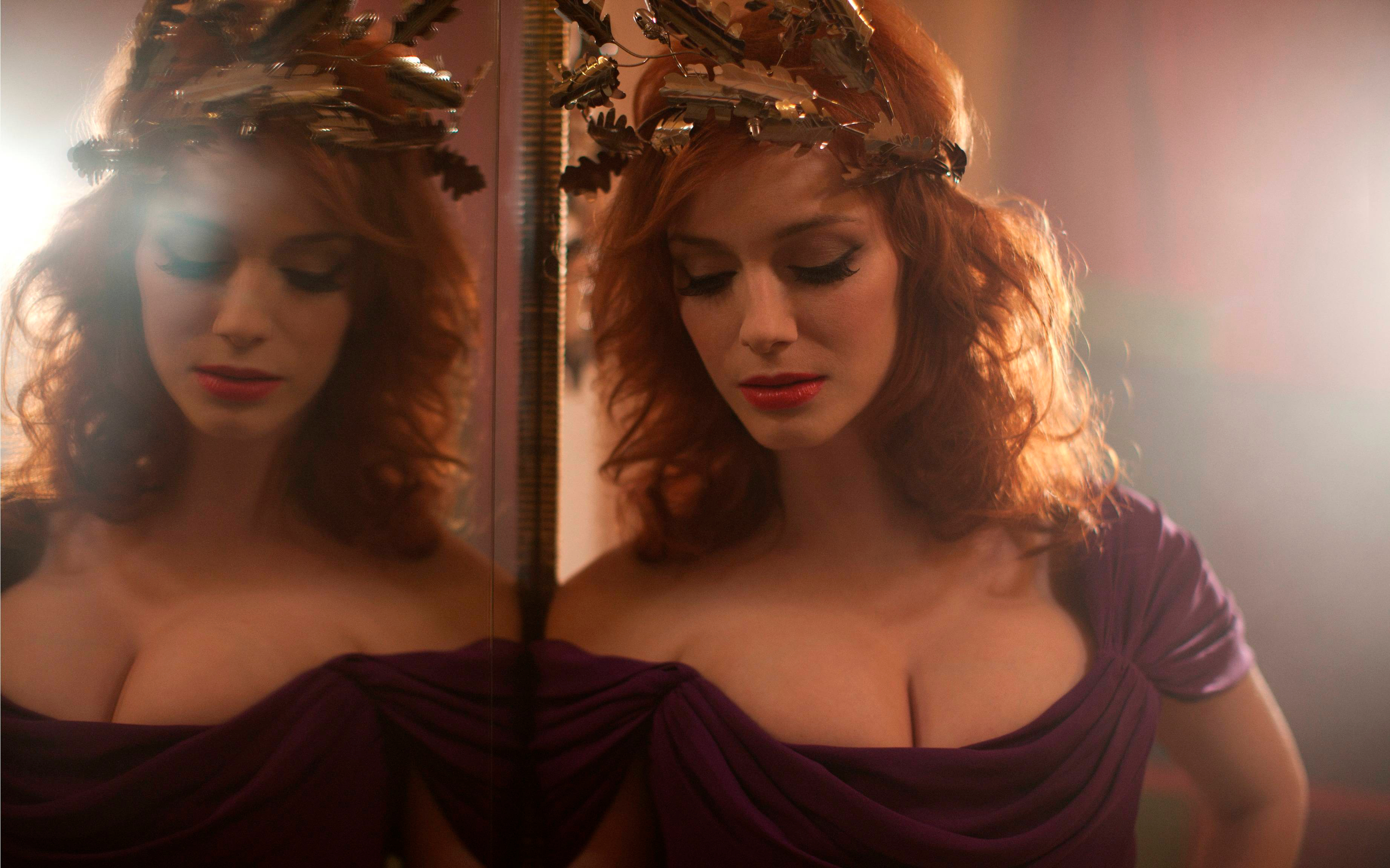 Christina Hendricks wearing a crown and purple dress HD Wallpaper