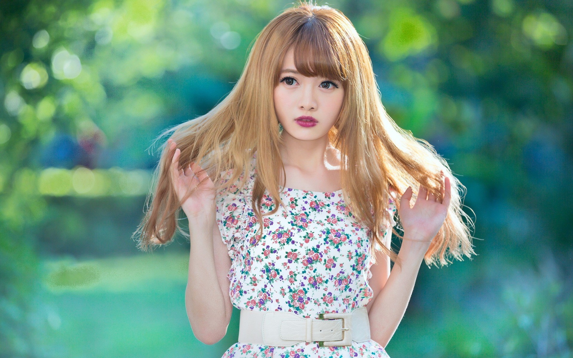 Young woman with blonde hair in a floral dress HD Wallpaper