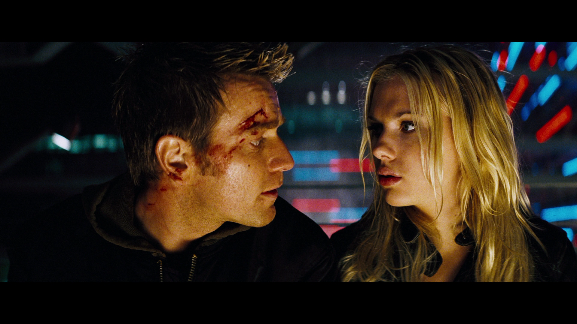 Ewan McGregor and Scarlett Johansson in a dark setting HD Wallpaper