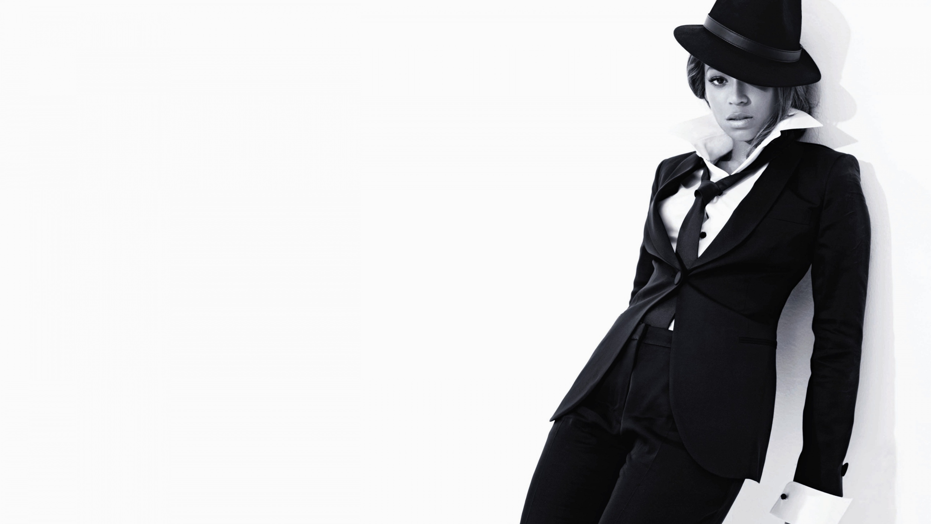 Beyoncé Knowles in a black suit and hat HD Wallpaper