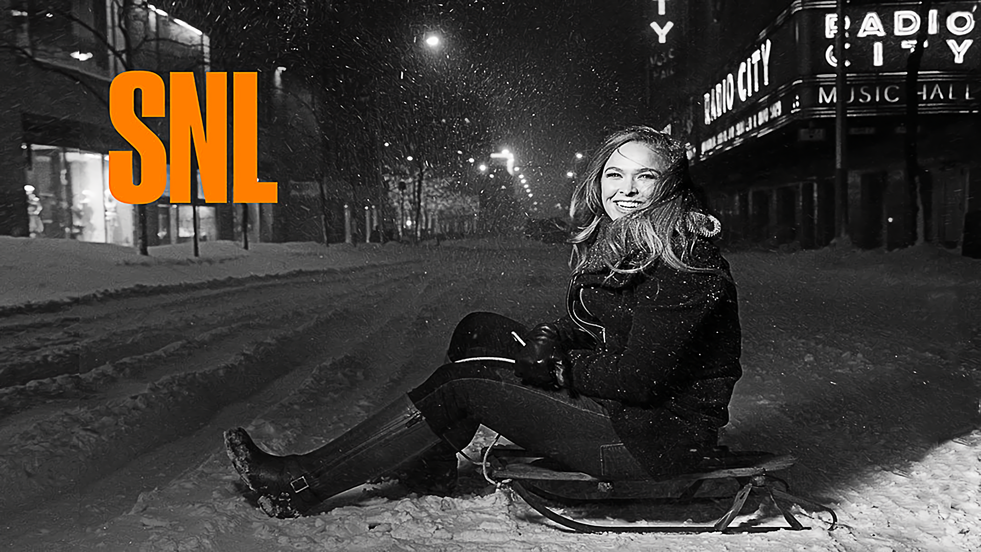 Ronda Rousey on a Sled in Front of Radio City Music Hall HD Wallpaper