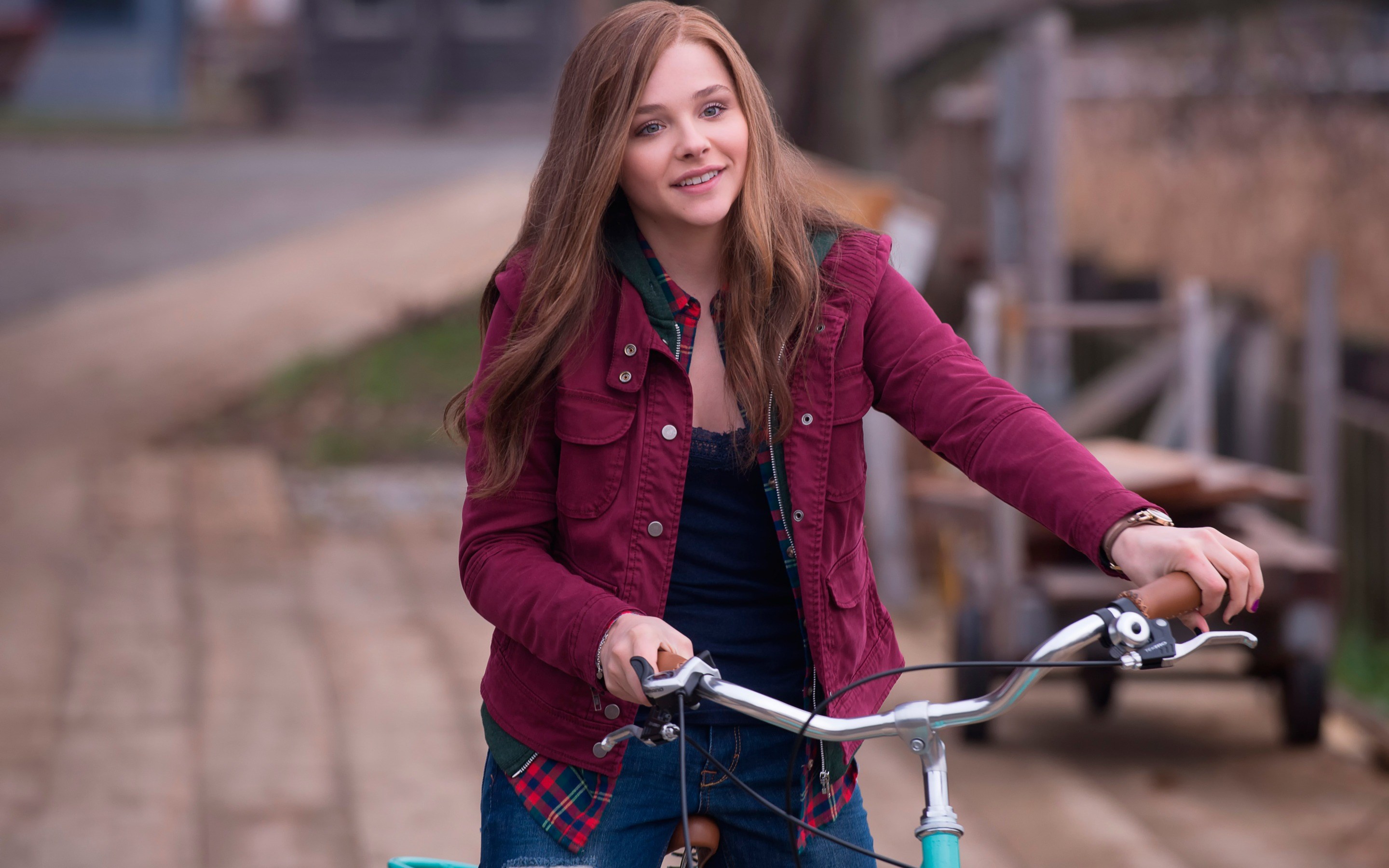 Chloe Grace Moretz on a bicycle HD Wallpaper