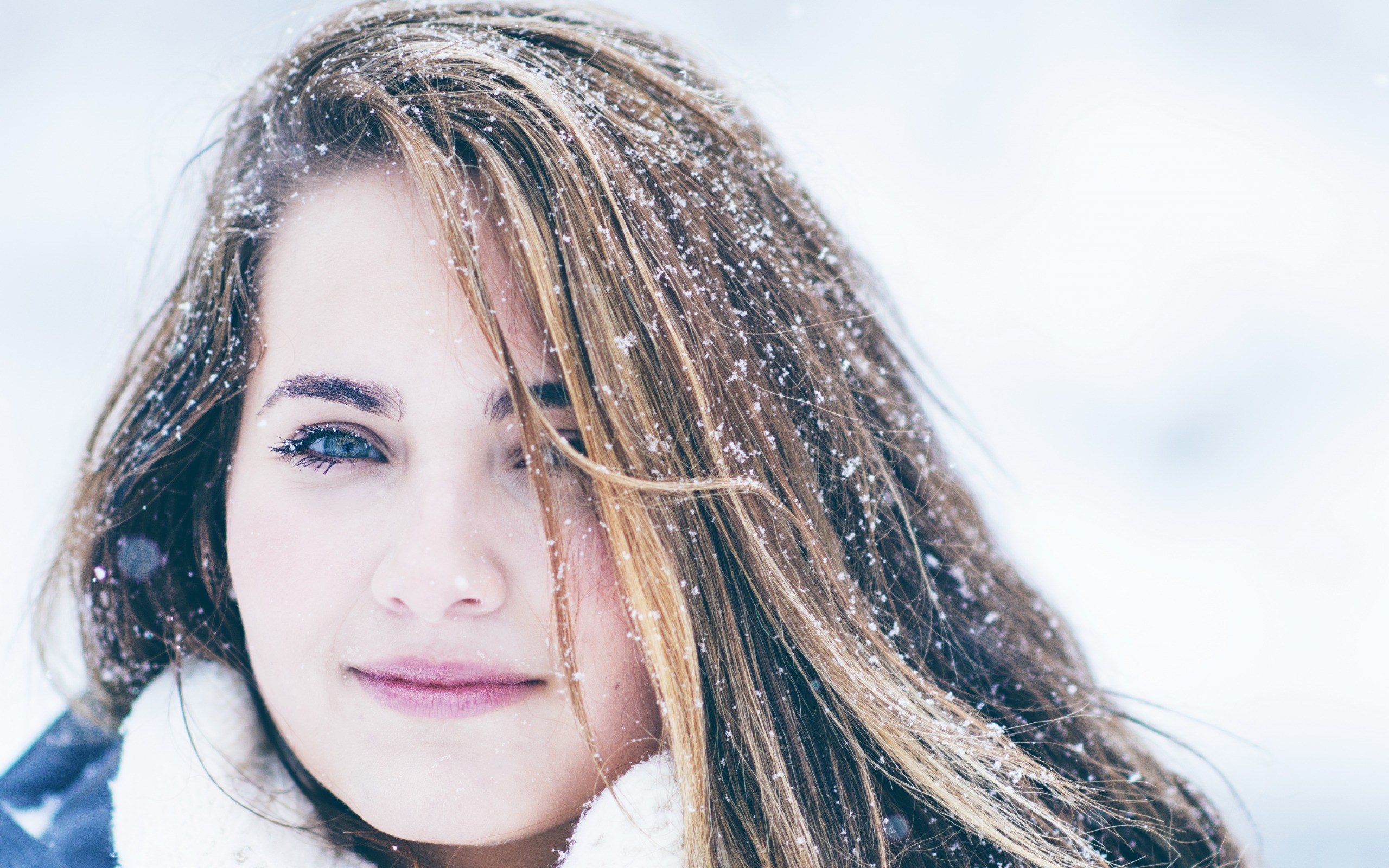 Woman with snow in her hair HD Wallpaper