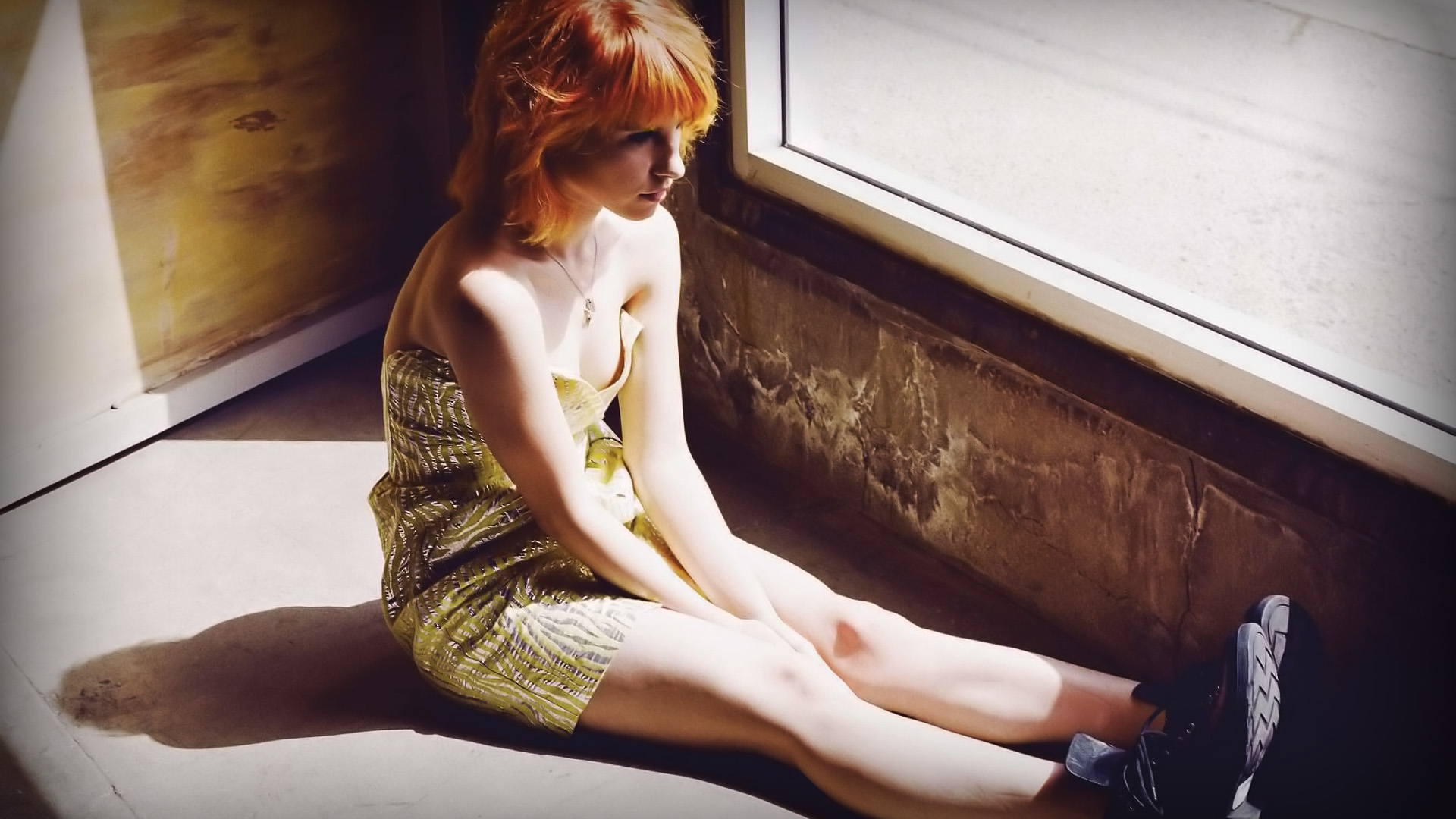 Hayley Williams sitting by a window HD Wallpaper