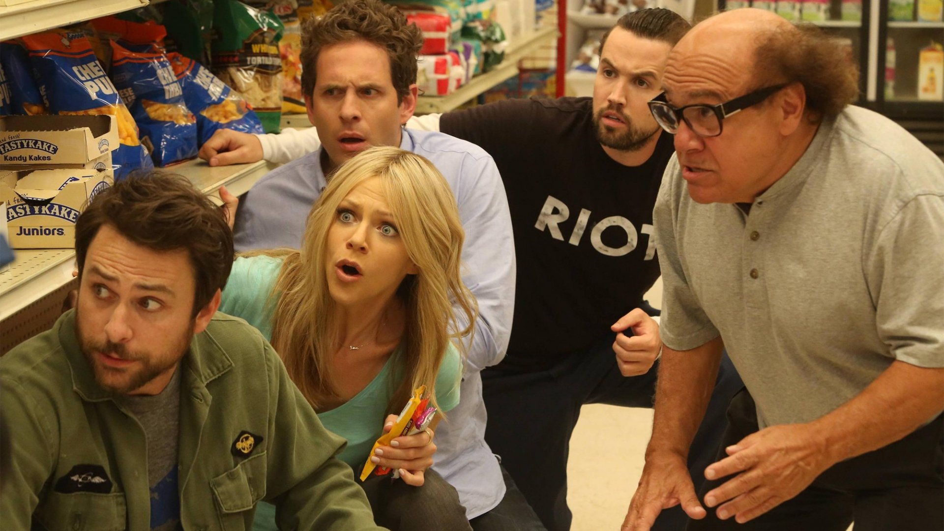 Charlie Day and friends in a grocery store aisle HD Wallpaper