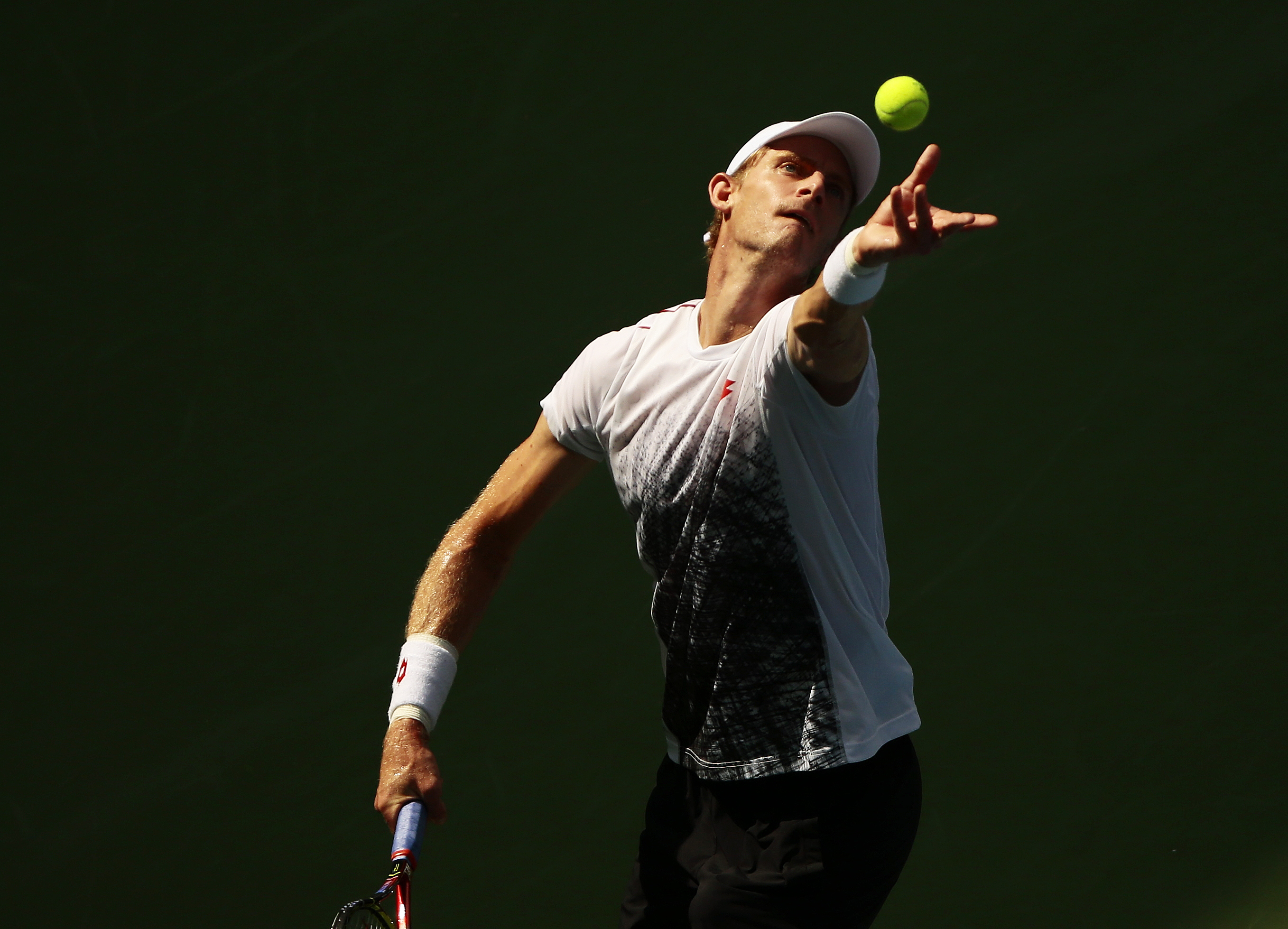 Kevin Anderson serving a tennis ball HD Wallpaper