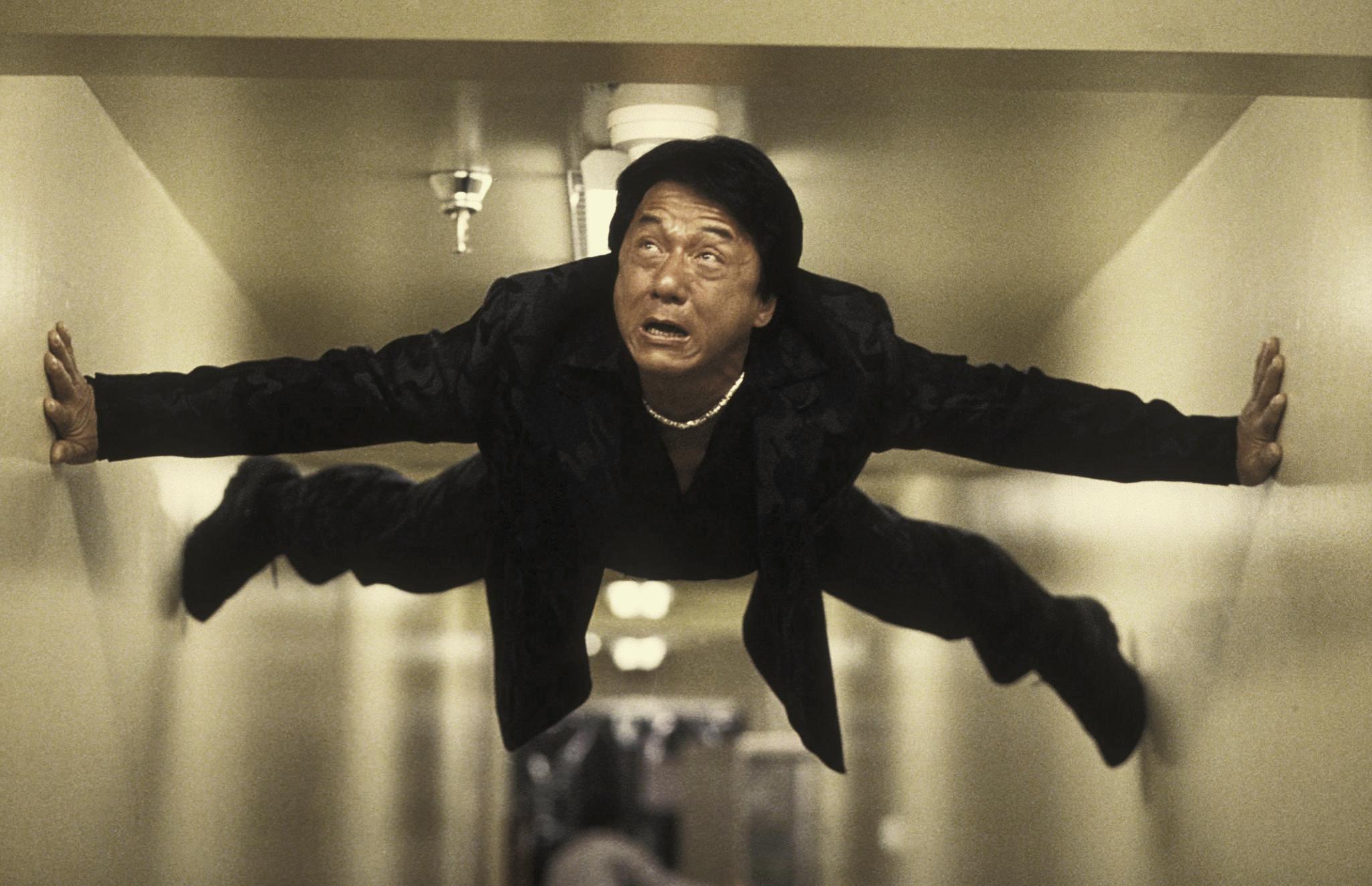 Jackie Chan in a hallway HD Wallpaper