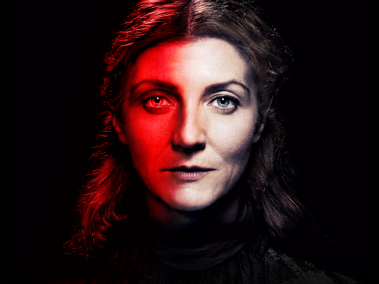 Michelle Fairley in dramatic lighting HD Wallpaper
