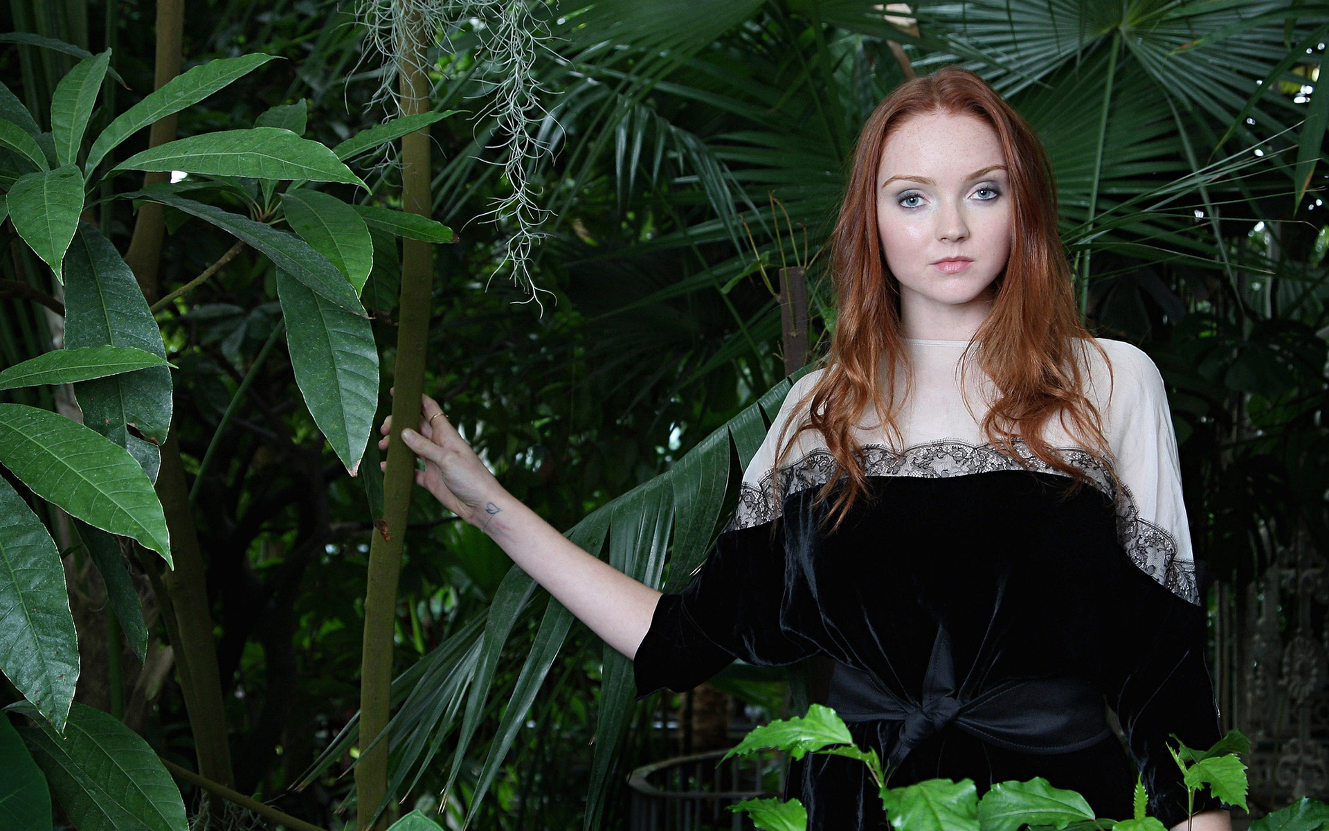 Lily Cole in a botanical garden HD Wallpaper