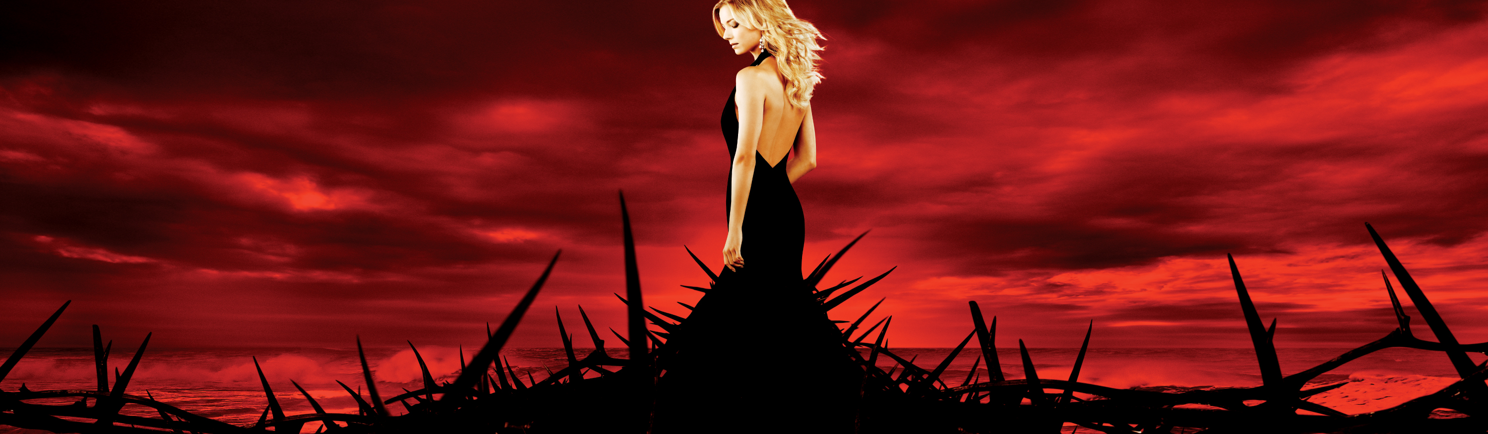 Emily VanCamp in a black dress against a red sky HD Wallpaper