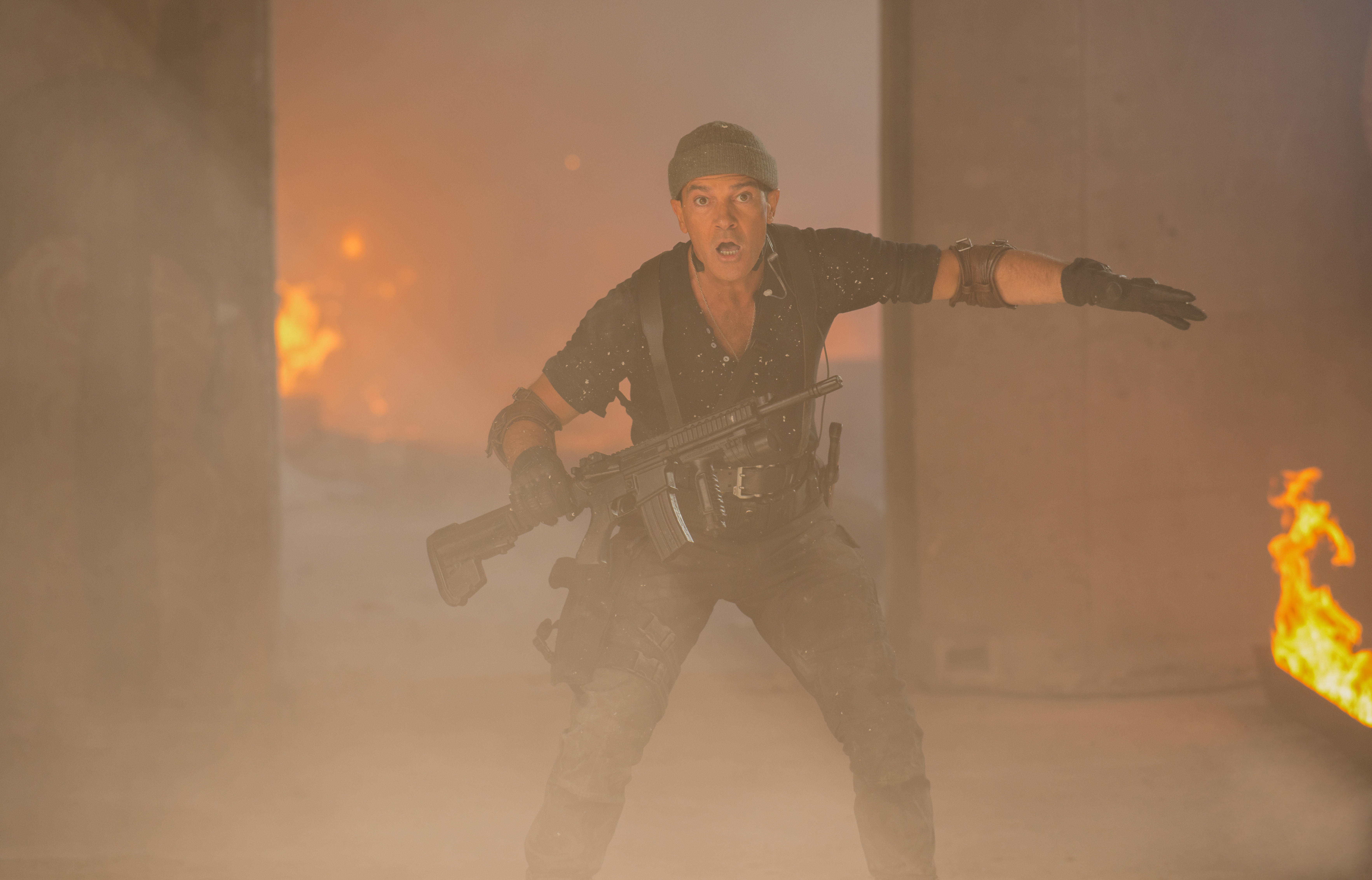 Antonio Banderas in a smoky, fiery environment HD Wallpaper