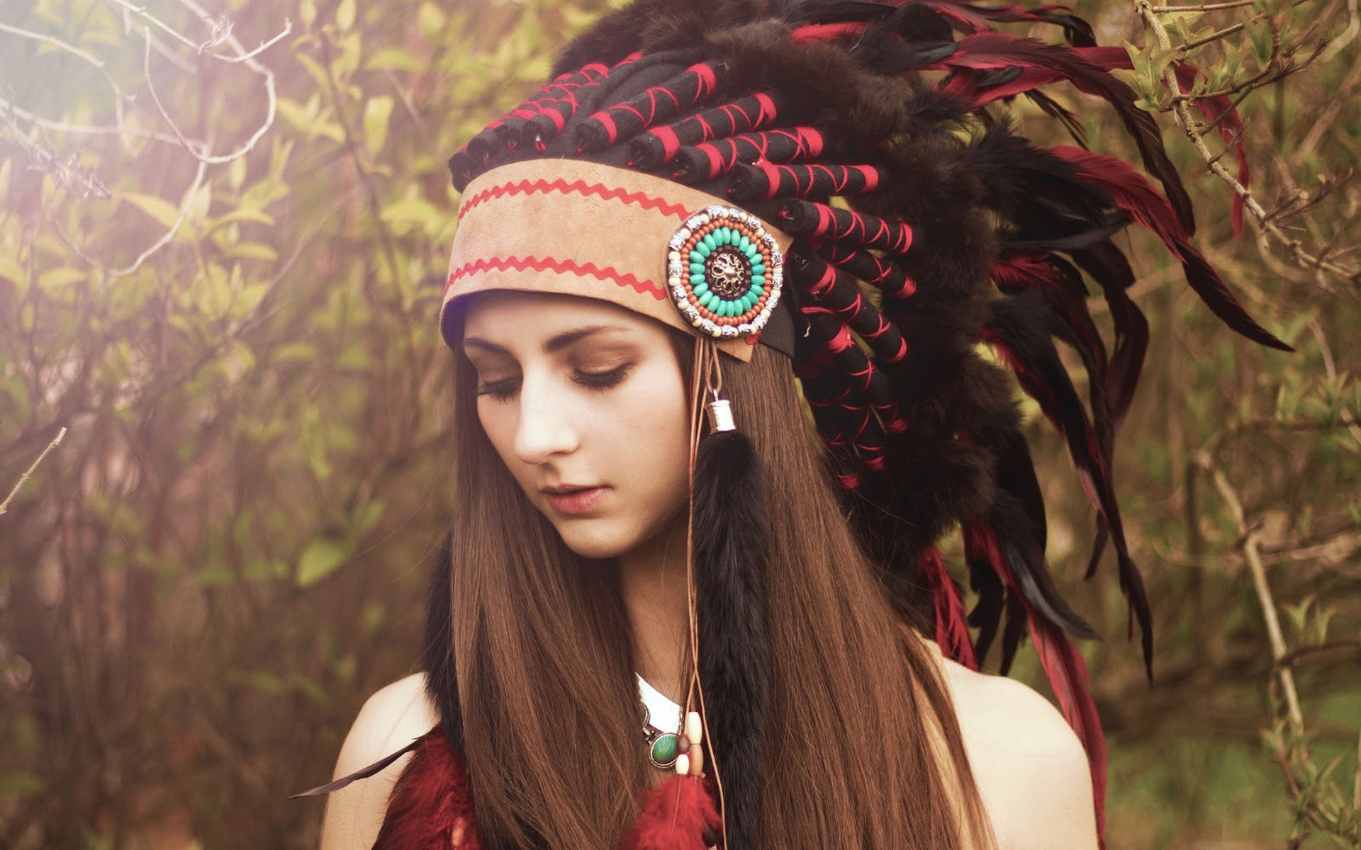 Woman wearing a Native American headdress HD Wallpaper