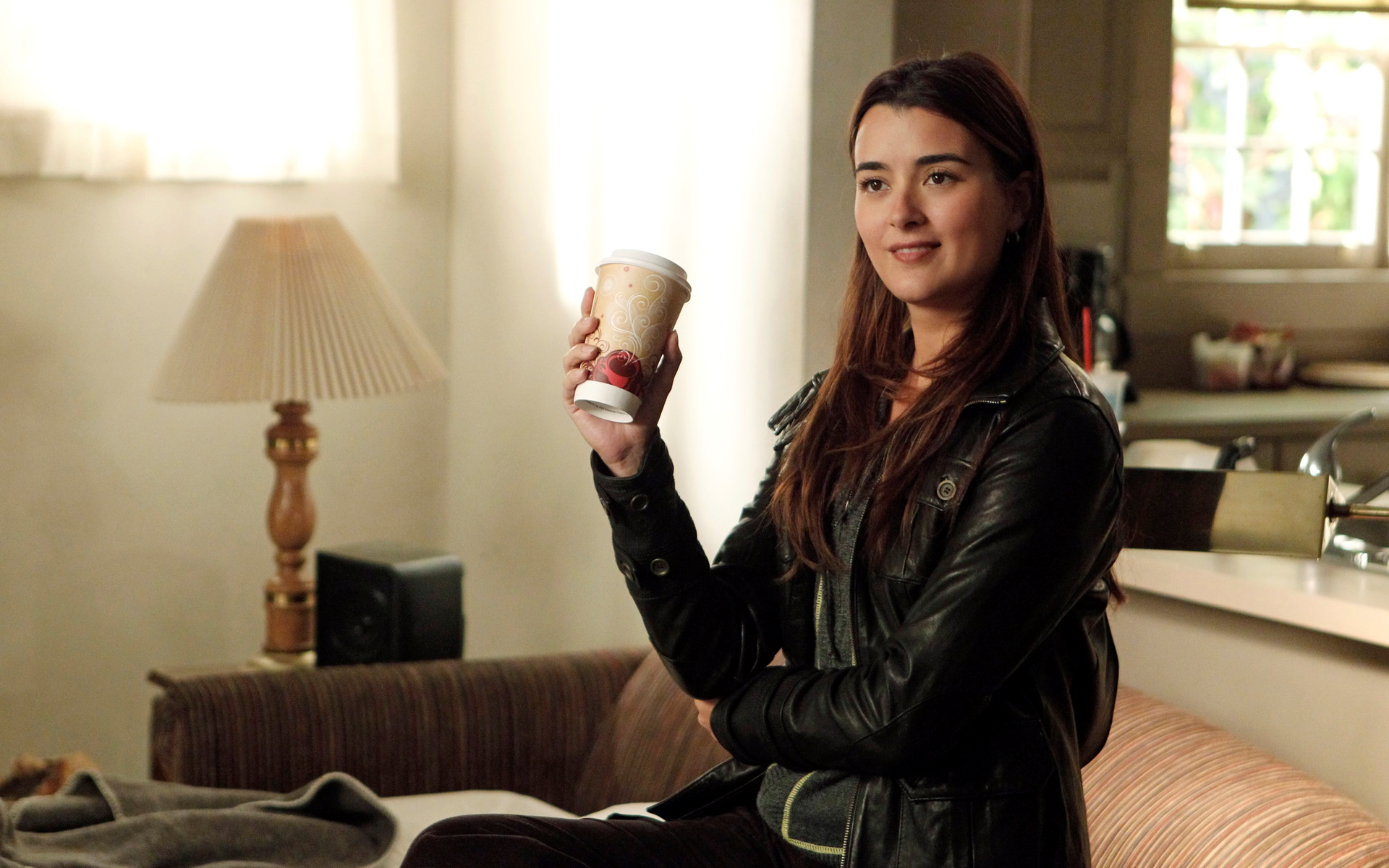 Cote de Pablo holding a coffee cup HD Wallpaper