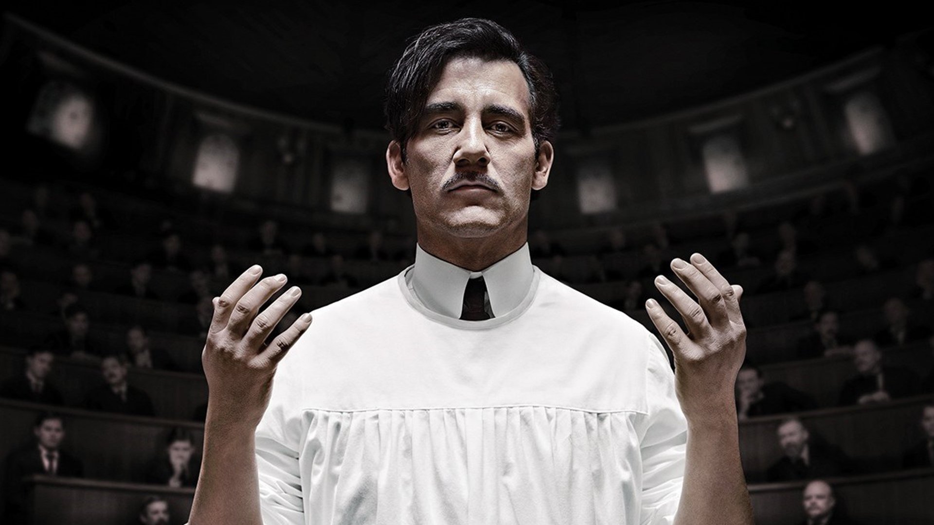 Clive Owen in a white medical gown HD Wallpaper