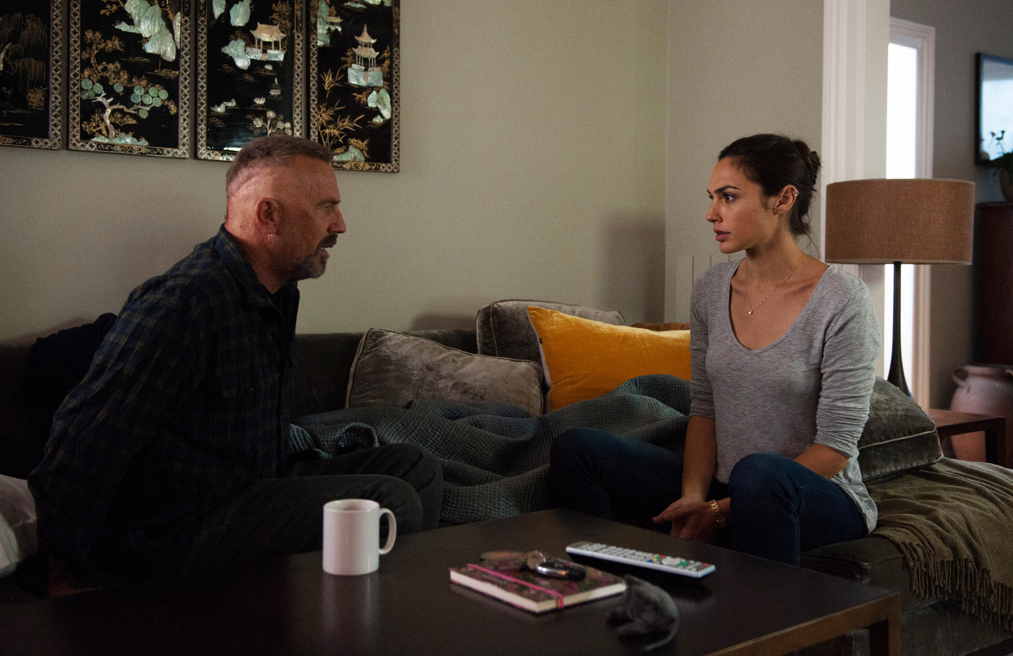 Kevin Costner and Gal Gadot sitting on a couch HD Wallpaper