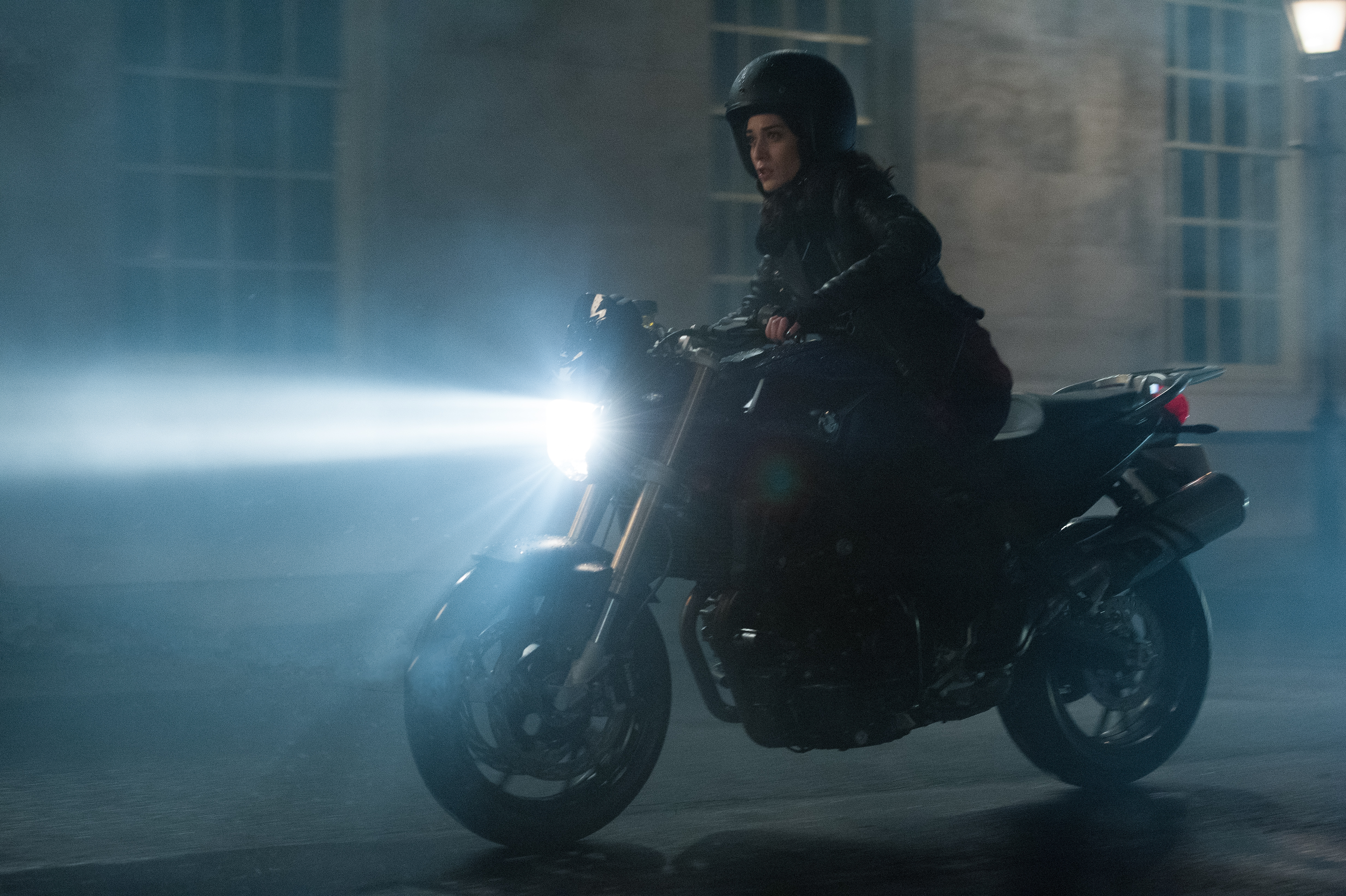 Lizzy Caplan riding a motorcycle HD Wallpaper