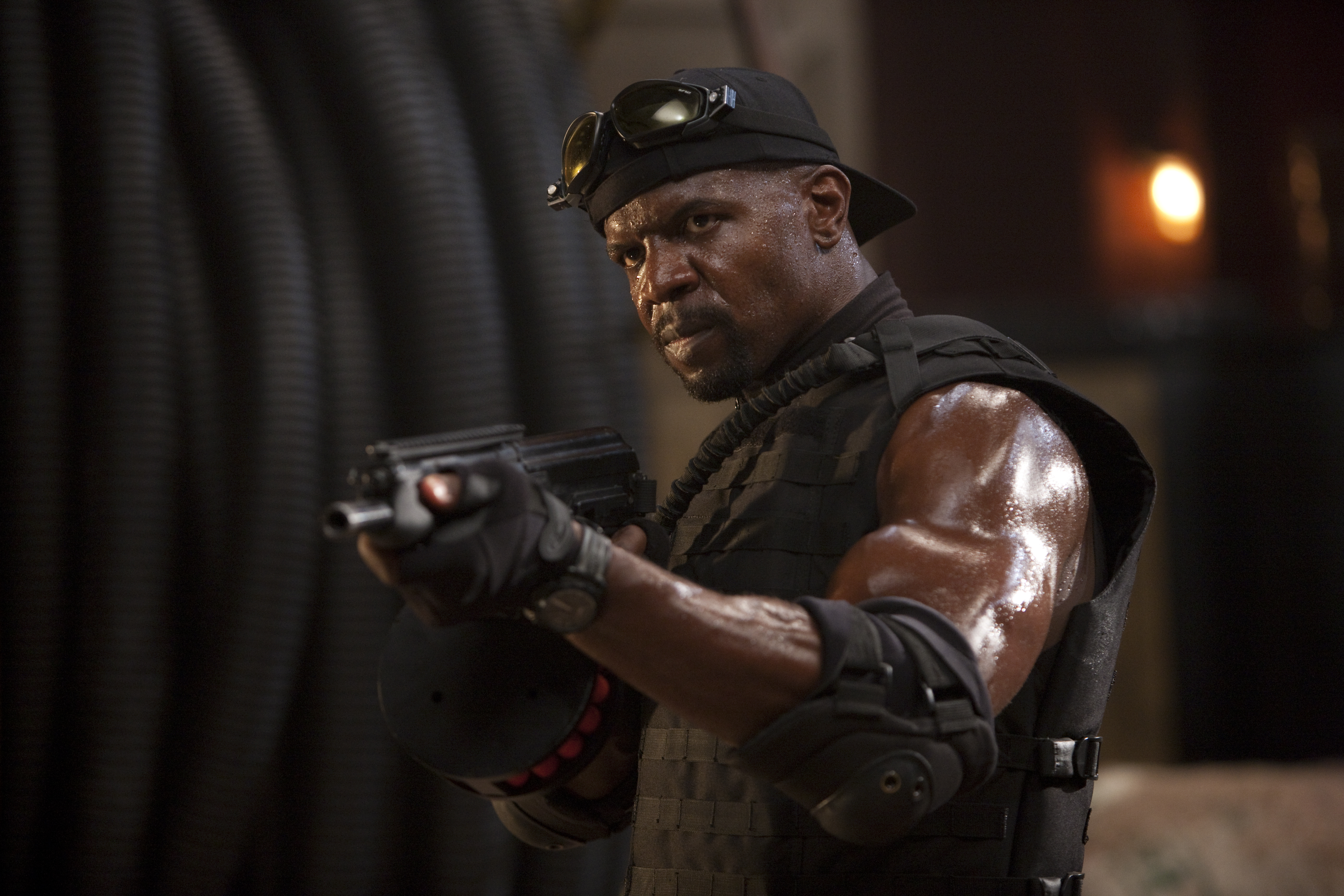 Terry Crews holding a gun HD Wallpaper