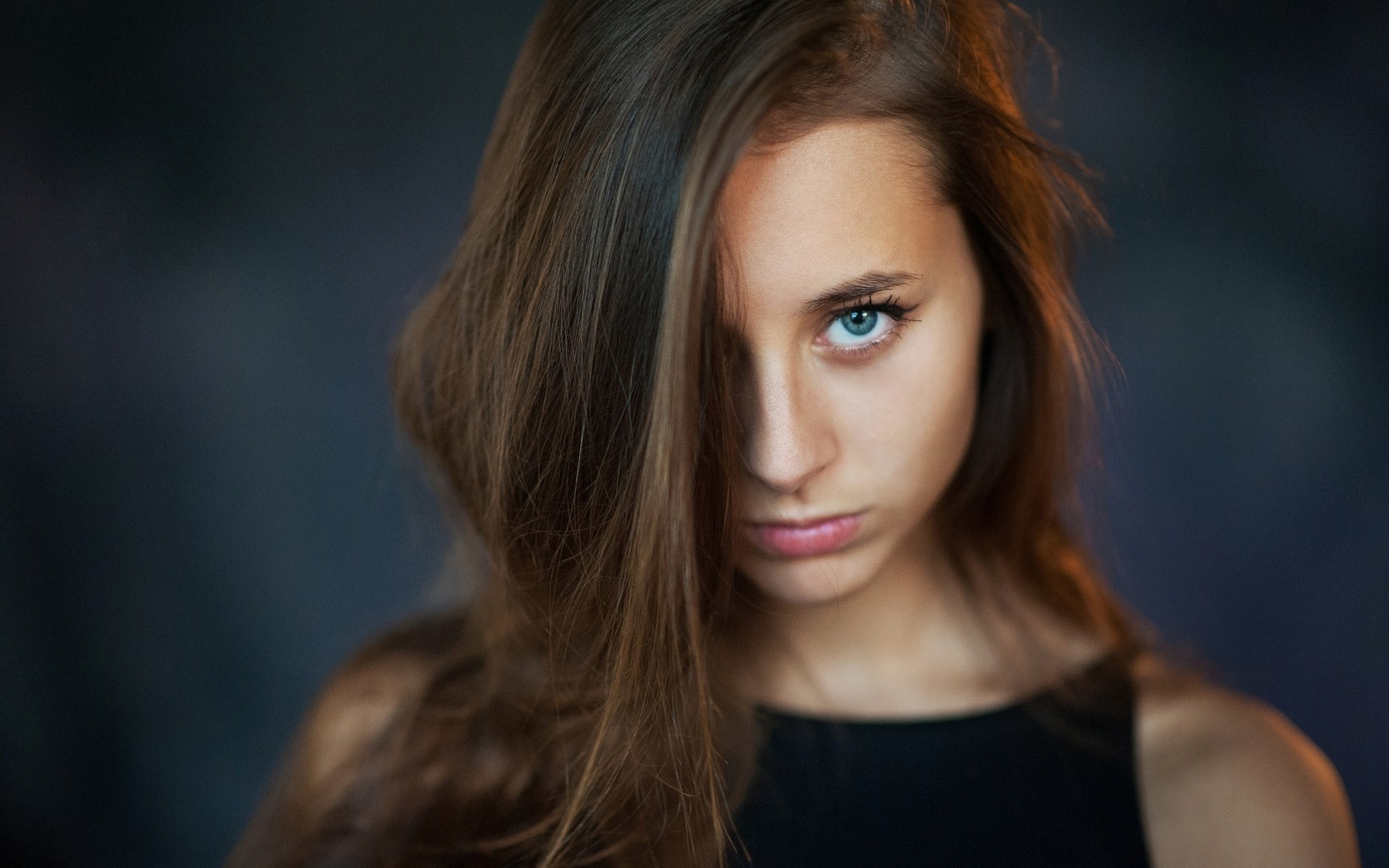 Woman with brown hair and blue eyes HD Wallpaper