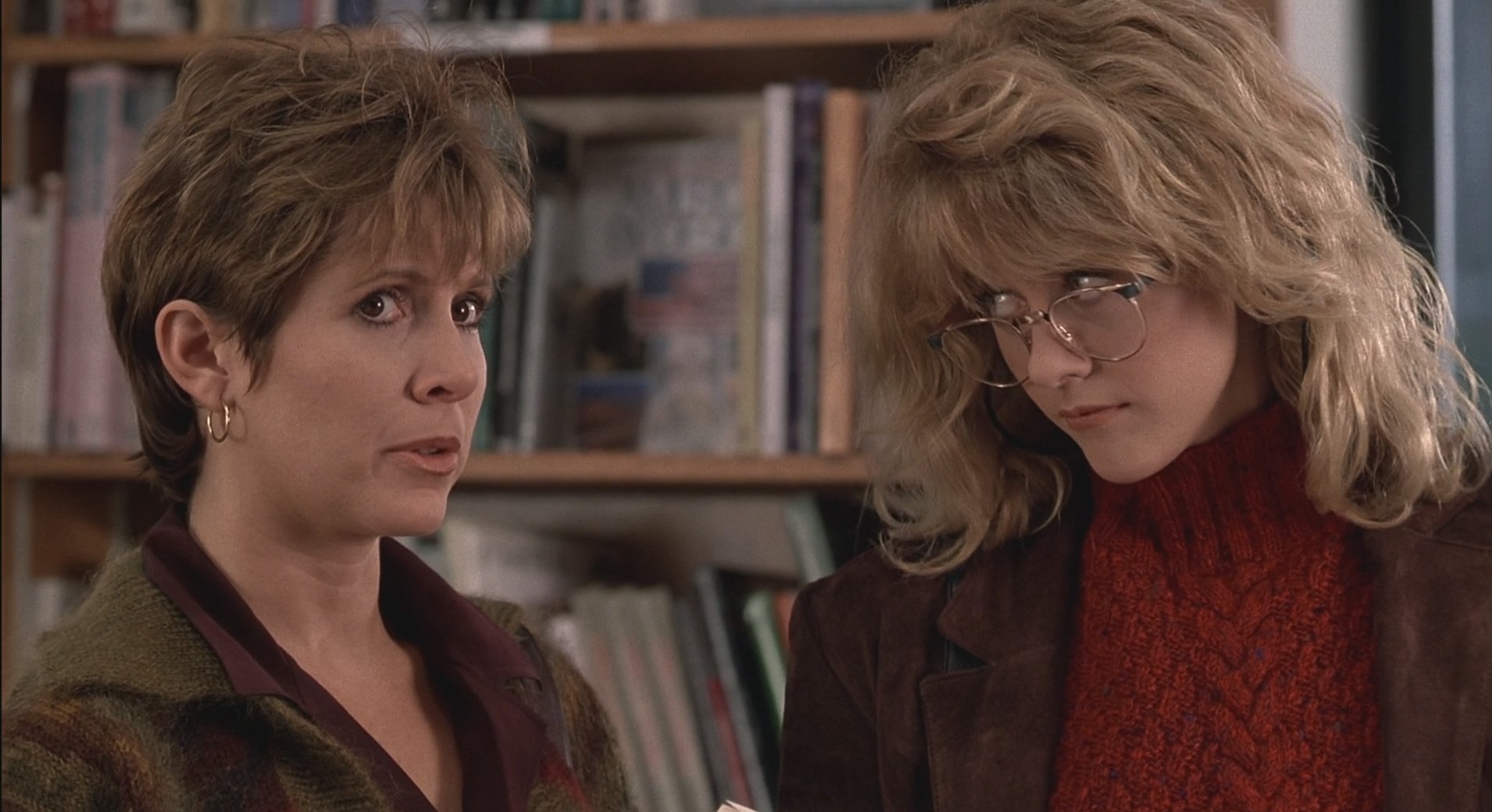Carrie Fisher and Meg Ryan in a library HD Wallpaper