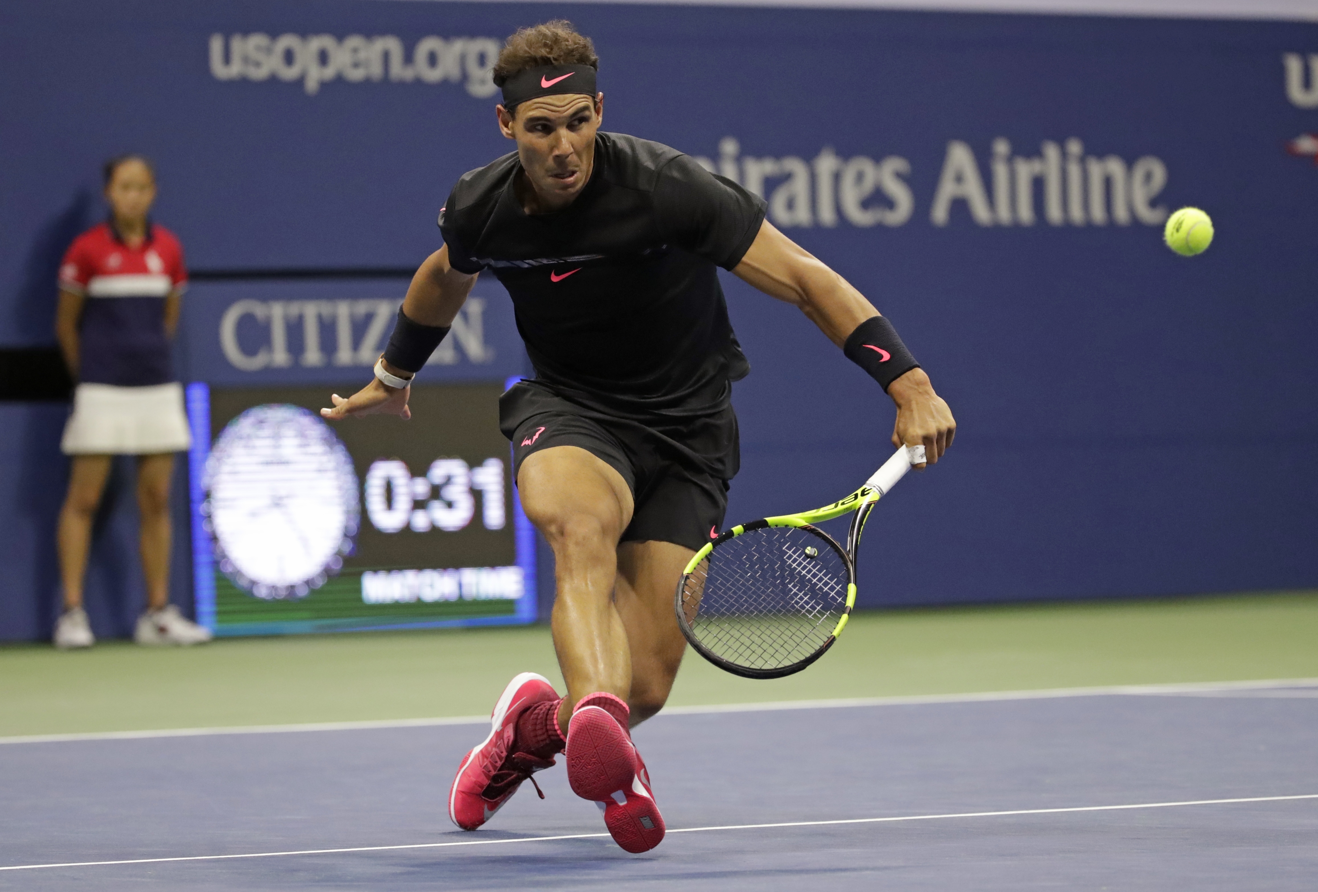 Rafael Nadal playing tennis at US Open HD Wallpaper