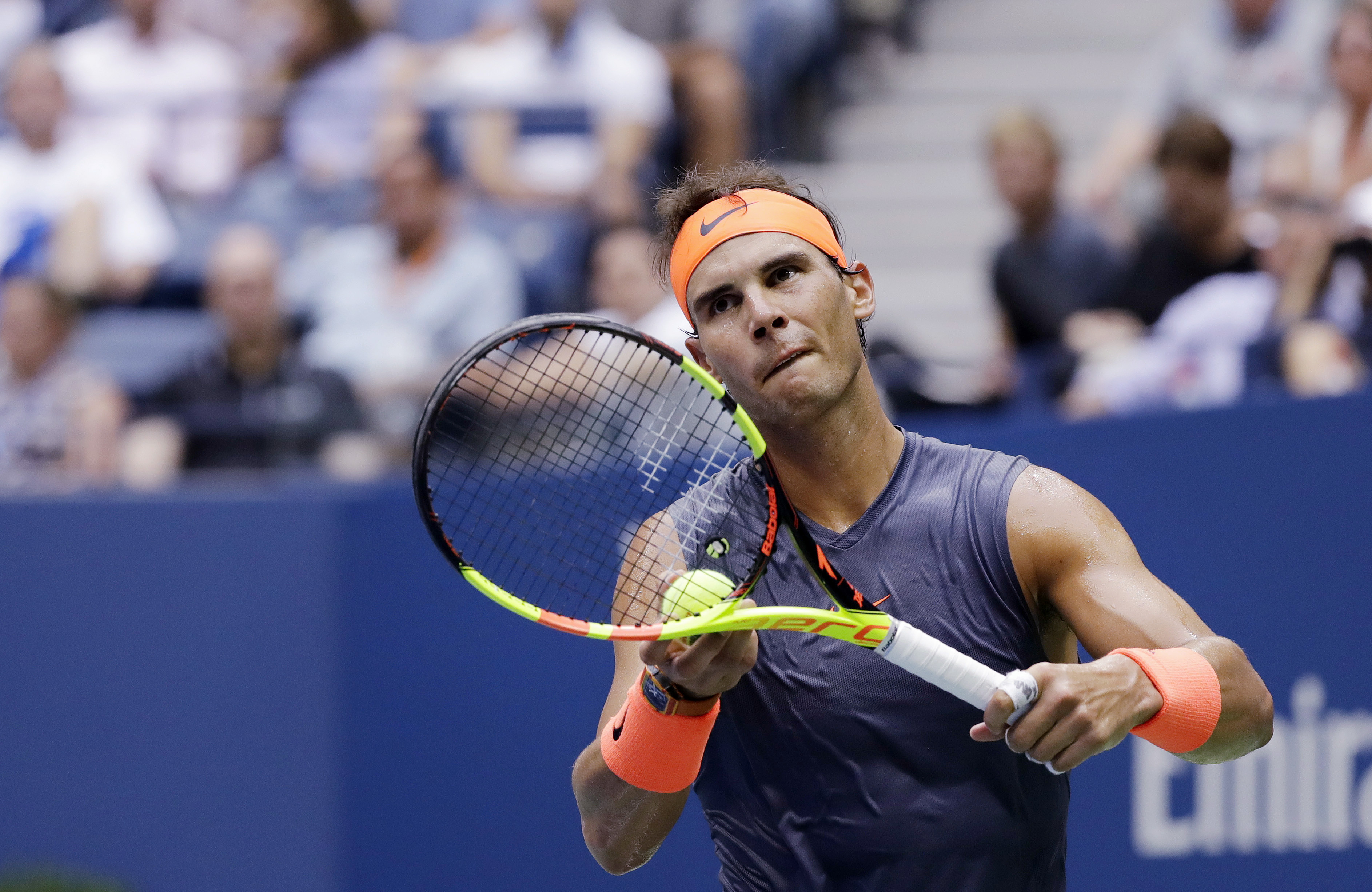 Rafael Nadal playing tennis HD Wallpaper