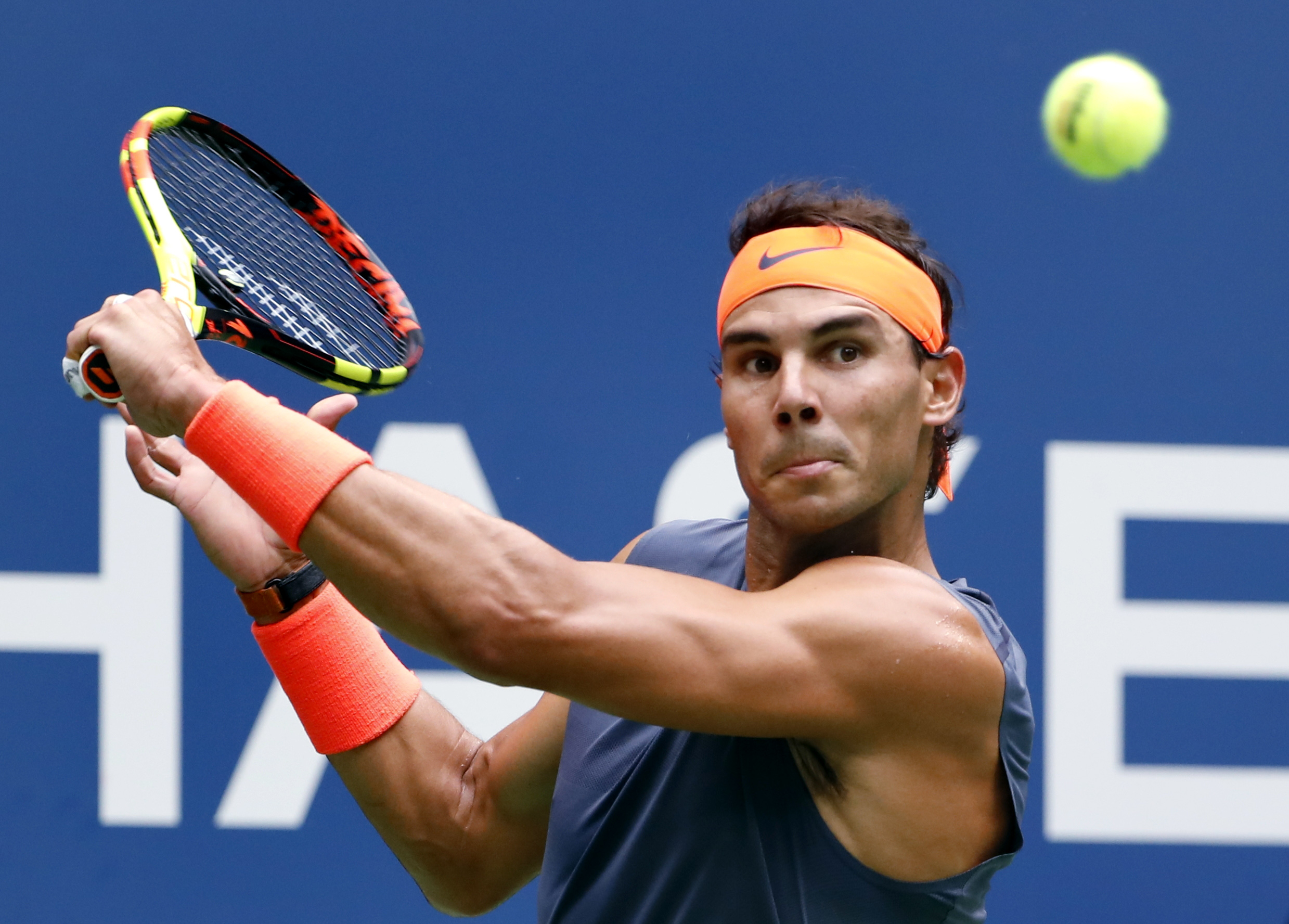 Rafael Nadal playing tennis HD Wallpaper