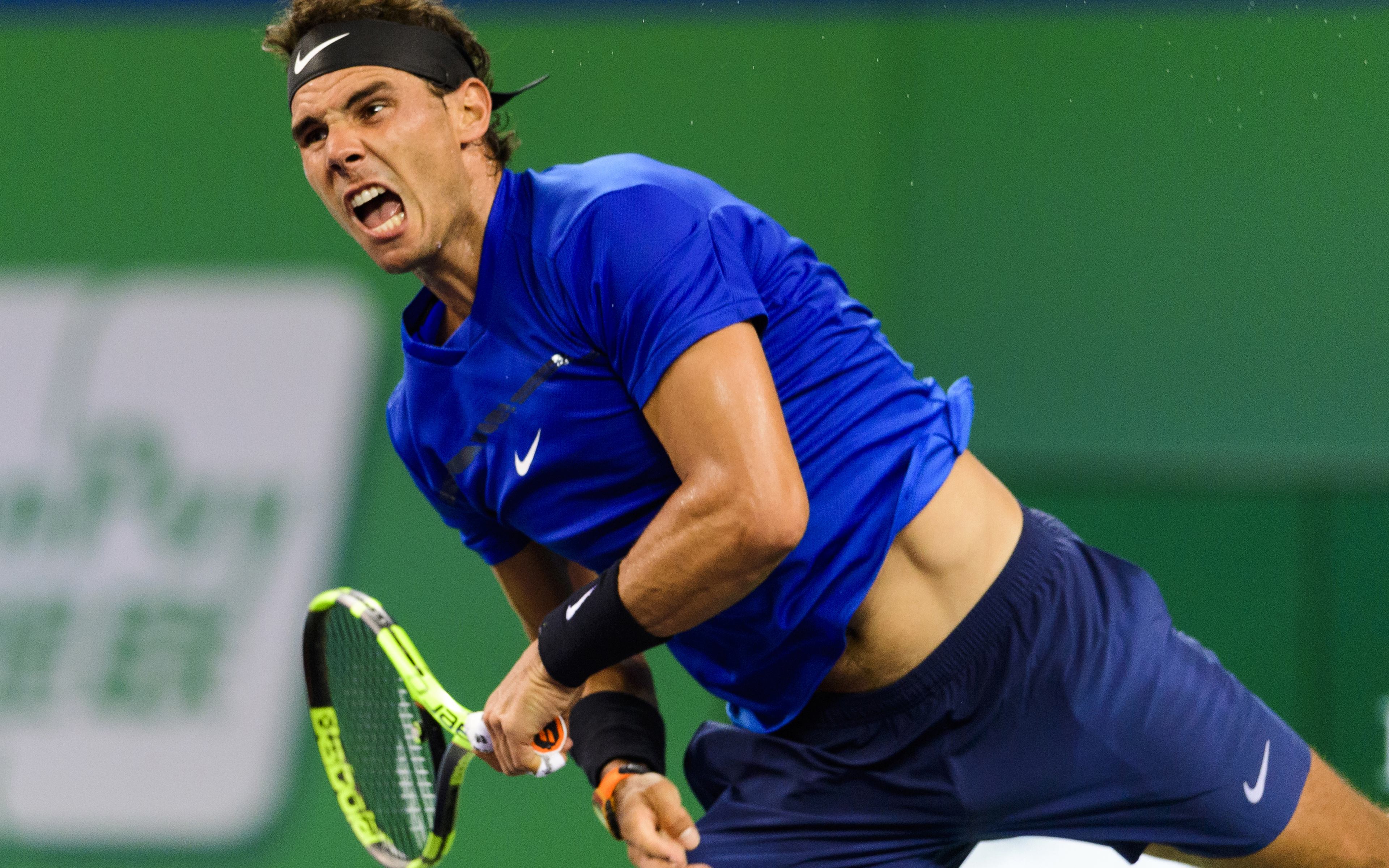 Rafael Nadal playing tennis HD Wallpaper
