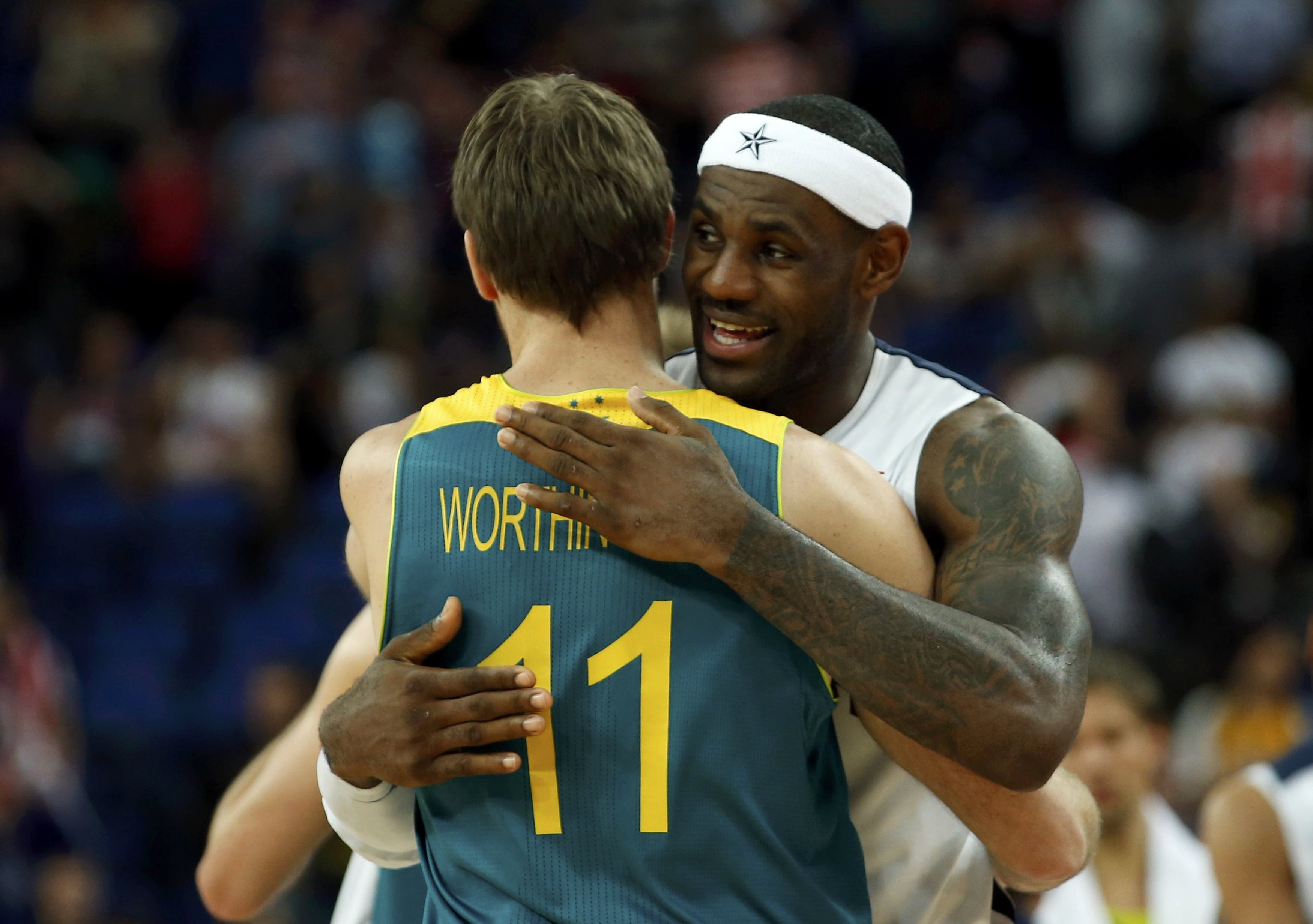 LeBron James hugging basketball player wearing number 11 HD Wallpaper