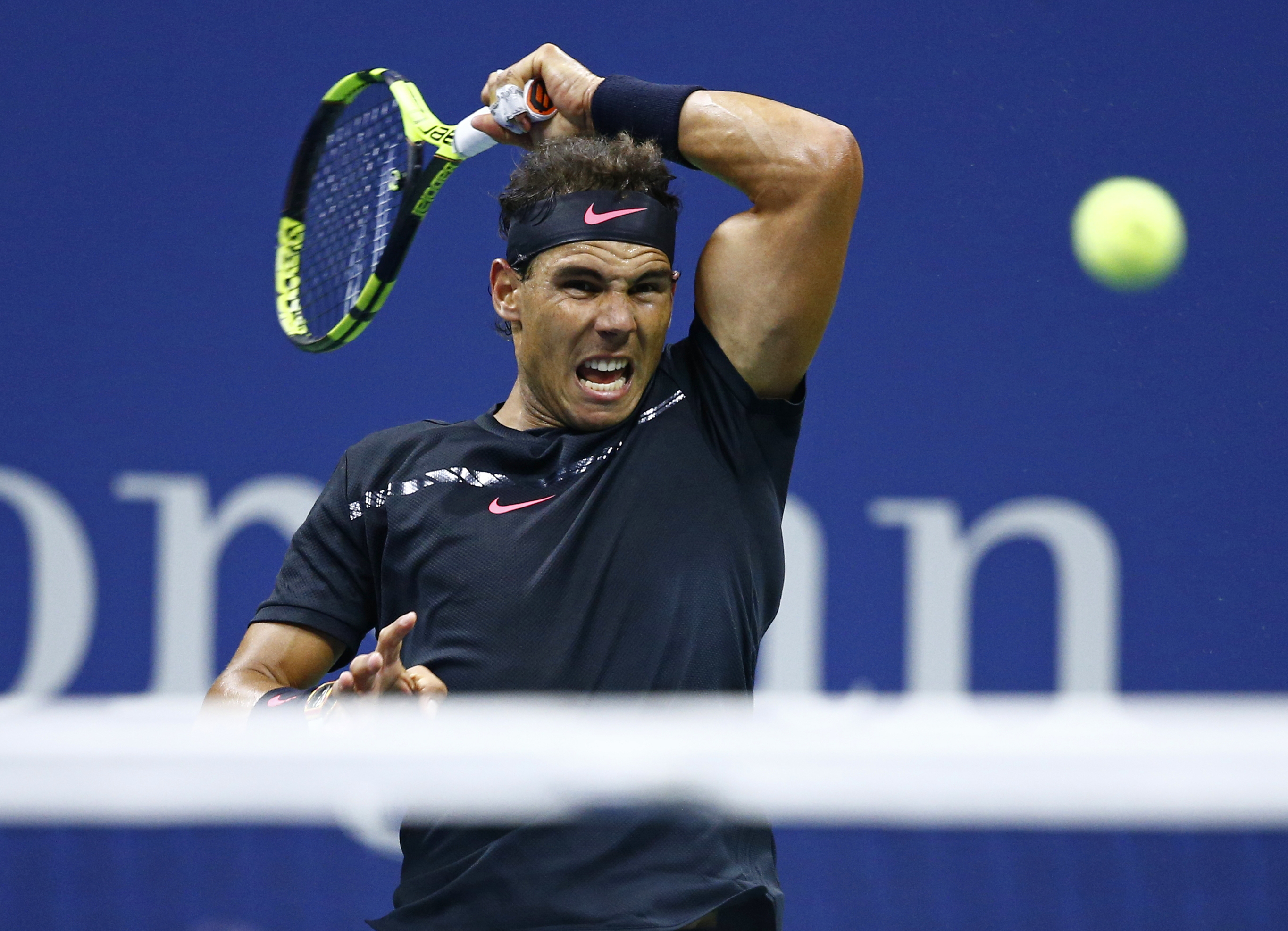 Rafael Nadal playing tennis HD Wallpaper