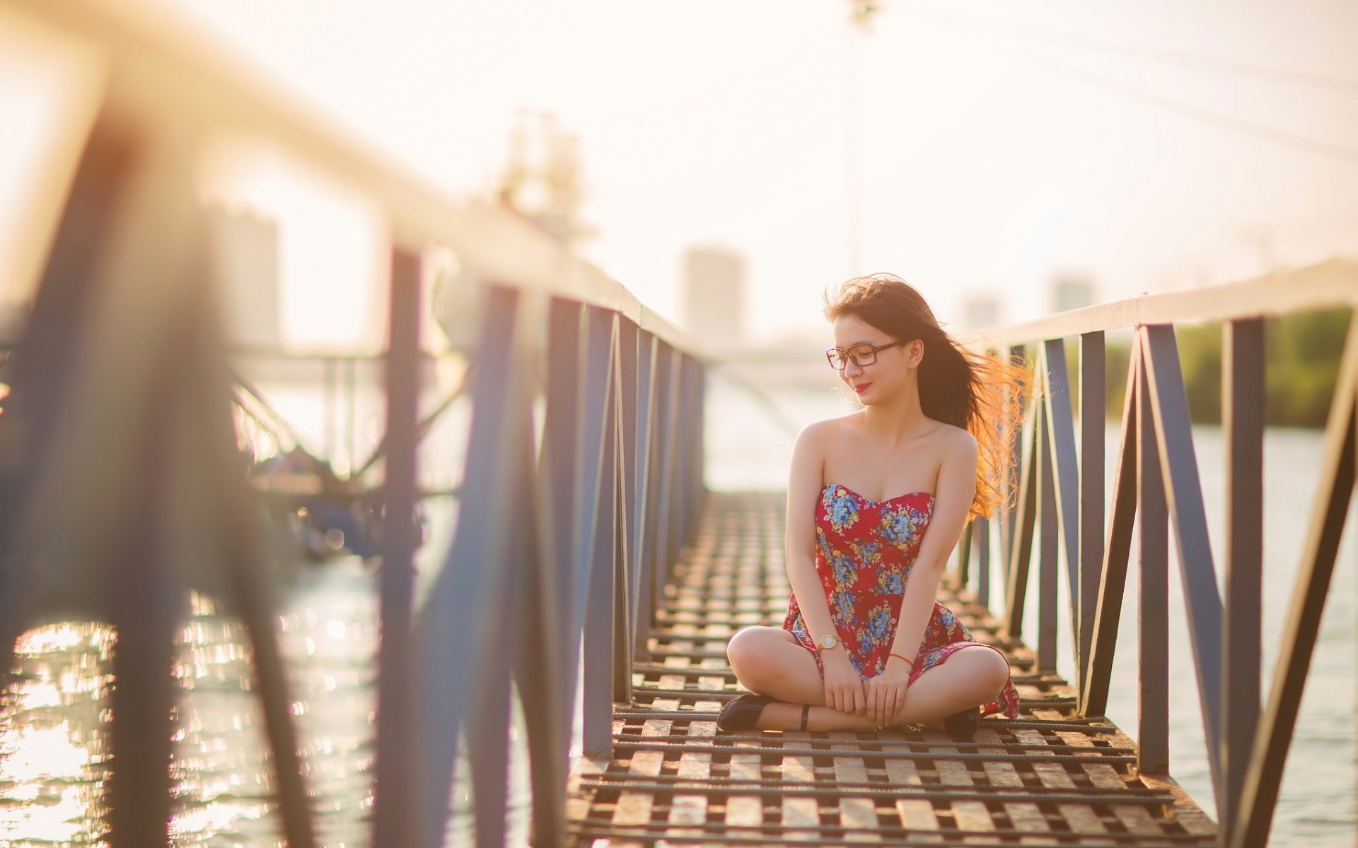 Woman in red dress sitting on a bridge HD Wallpaper