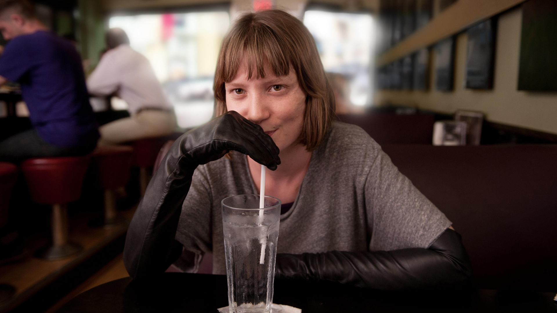 Mia Wasikowska drinking from a glass HD Wallpaper