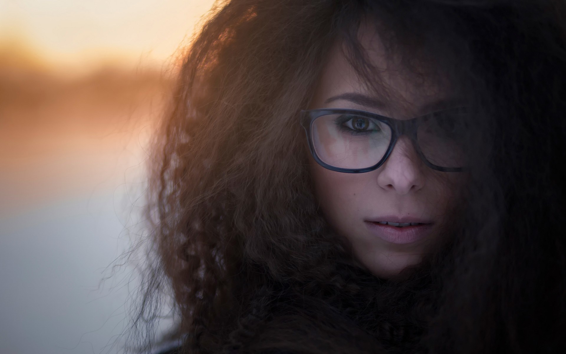 Woman with curly hair and glasses HD Wallpaper