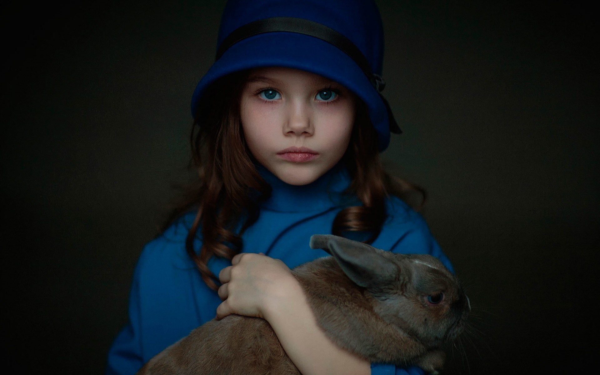 Girl in blue hat holding a rabbit HD Wallpaper