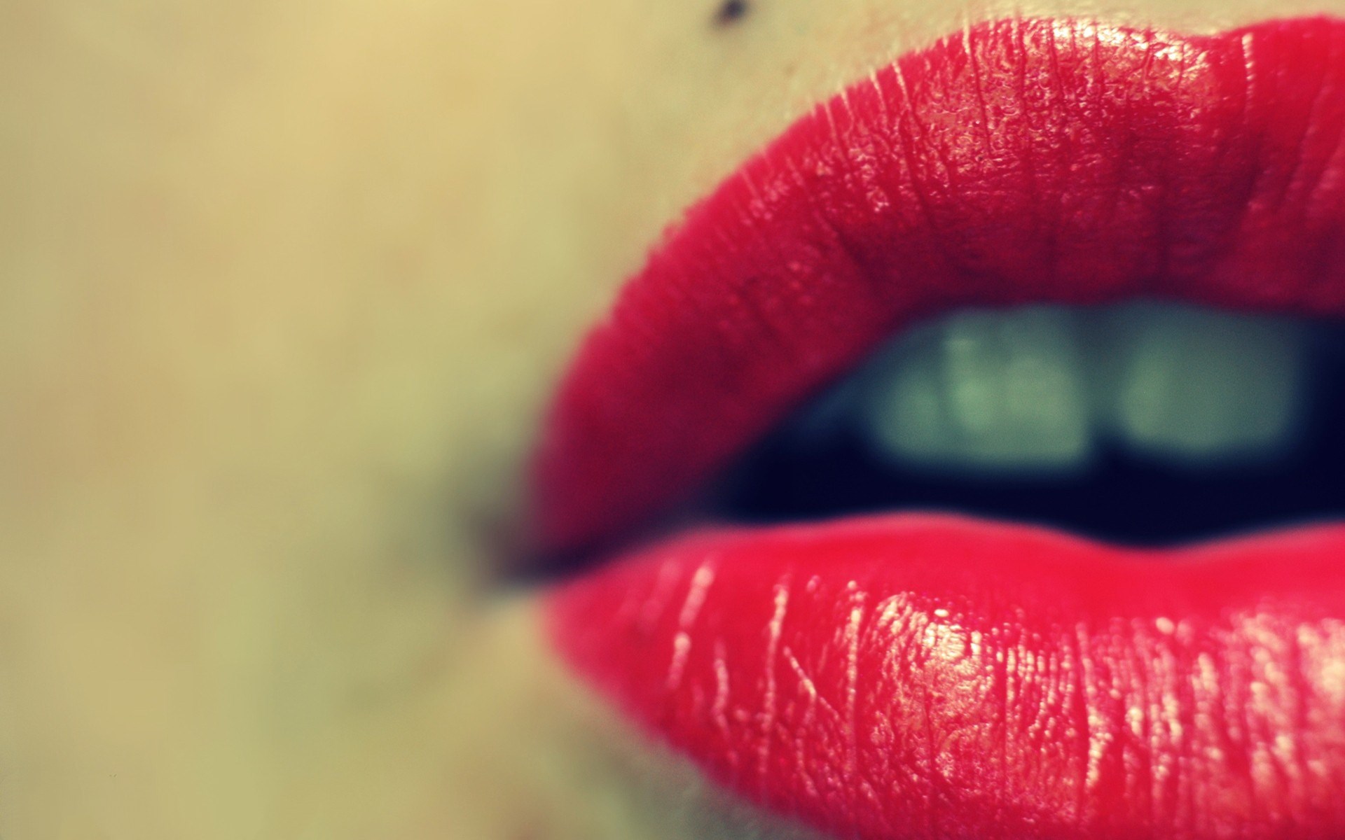 Close-up of red lips with teeth showing HD Wallpaper