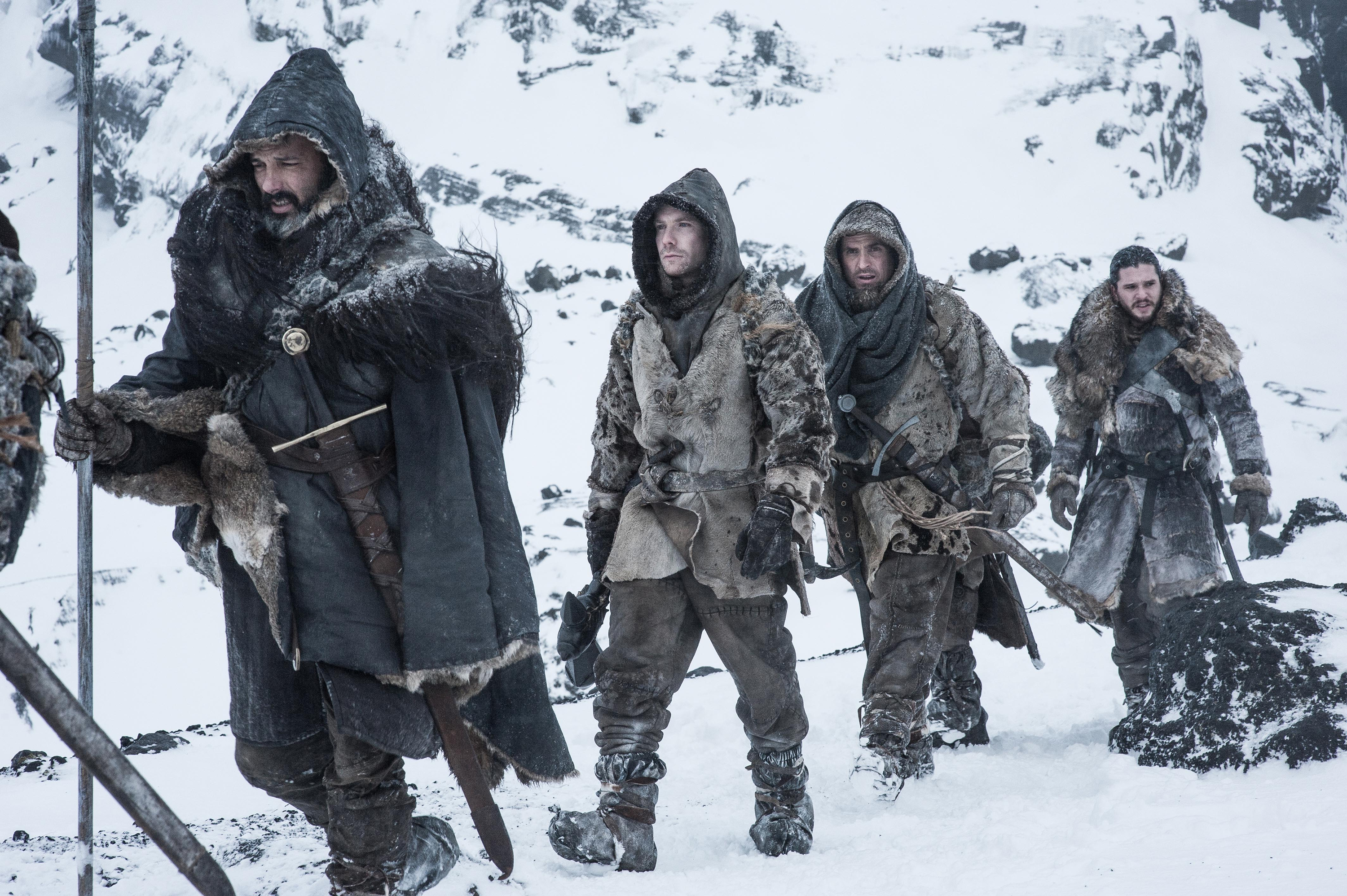 Joe Dempsie and companions in snowy landscape HD Wallpaper