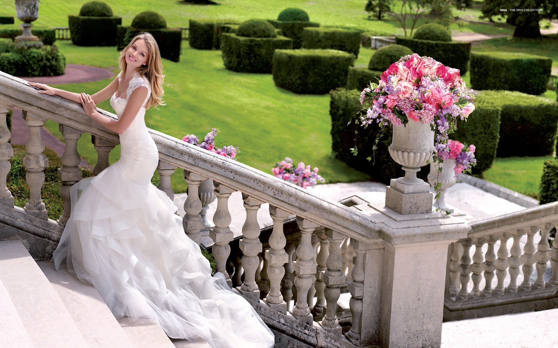 Lindsay Ellingson in a wedding dress on stairs HD Wallpaper