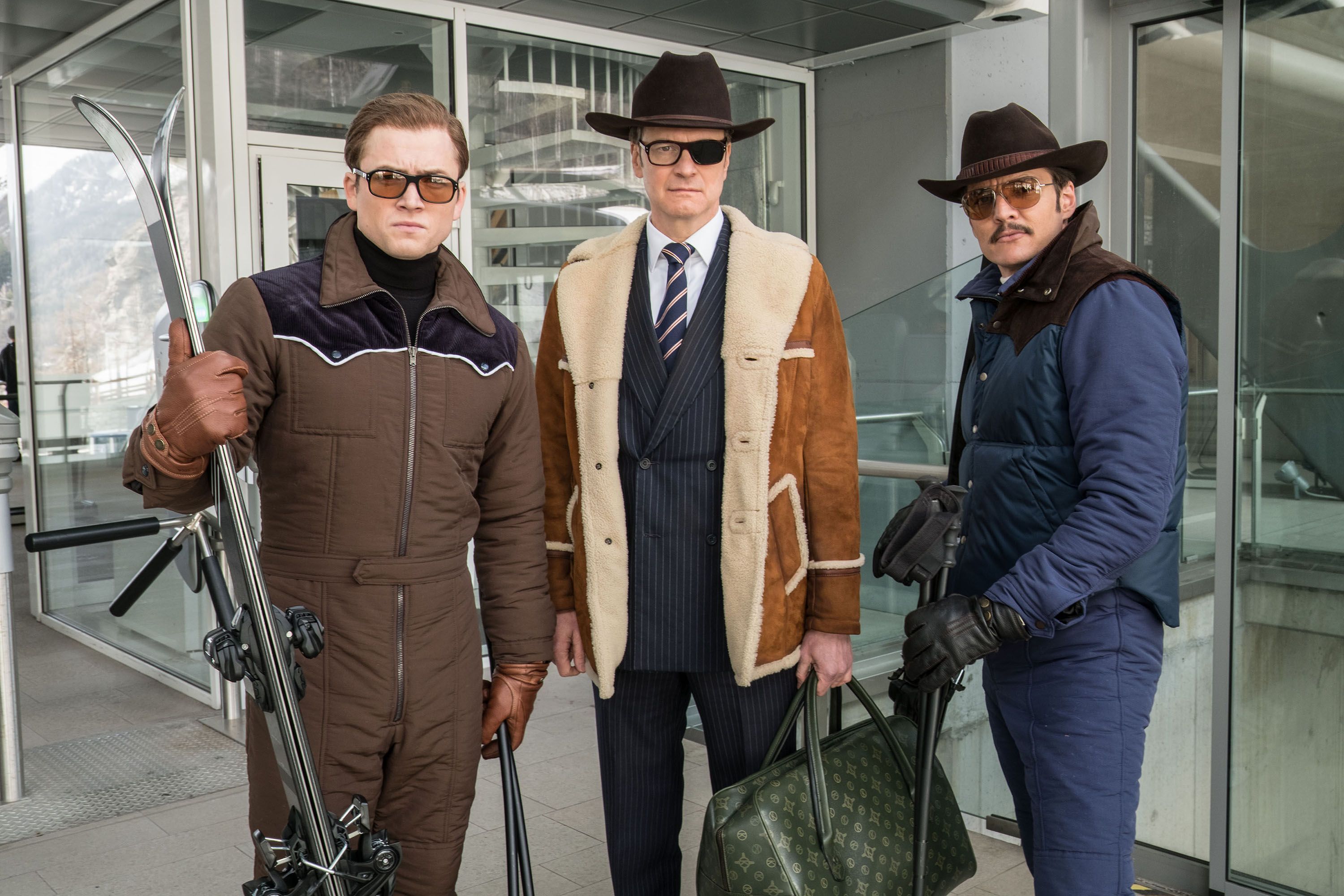 Taron Egerton and two men in ski attire HD Wallpaper