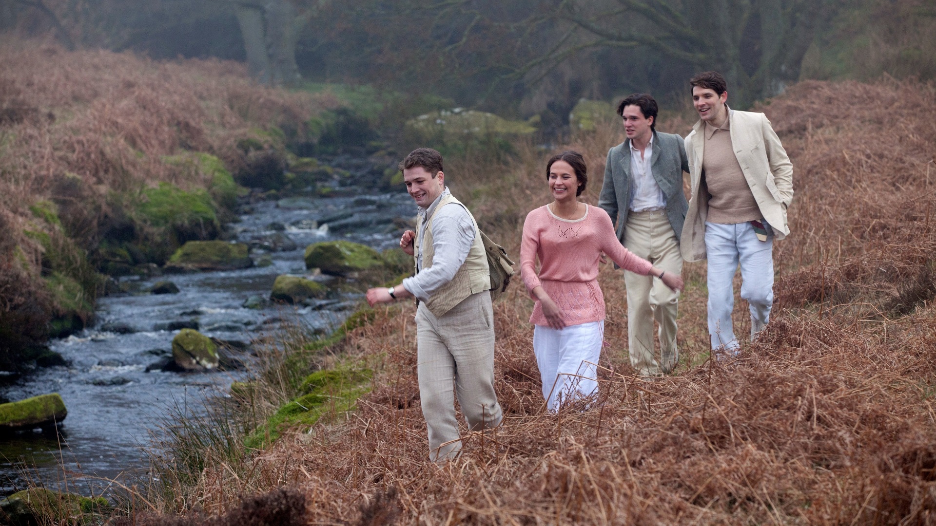 Taron Egerton and friends walking by a stream HD Wallpaper
