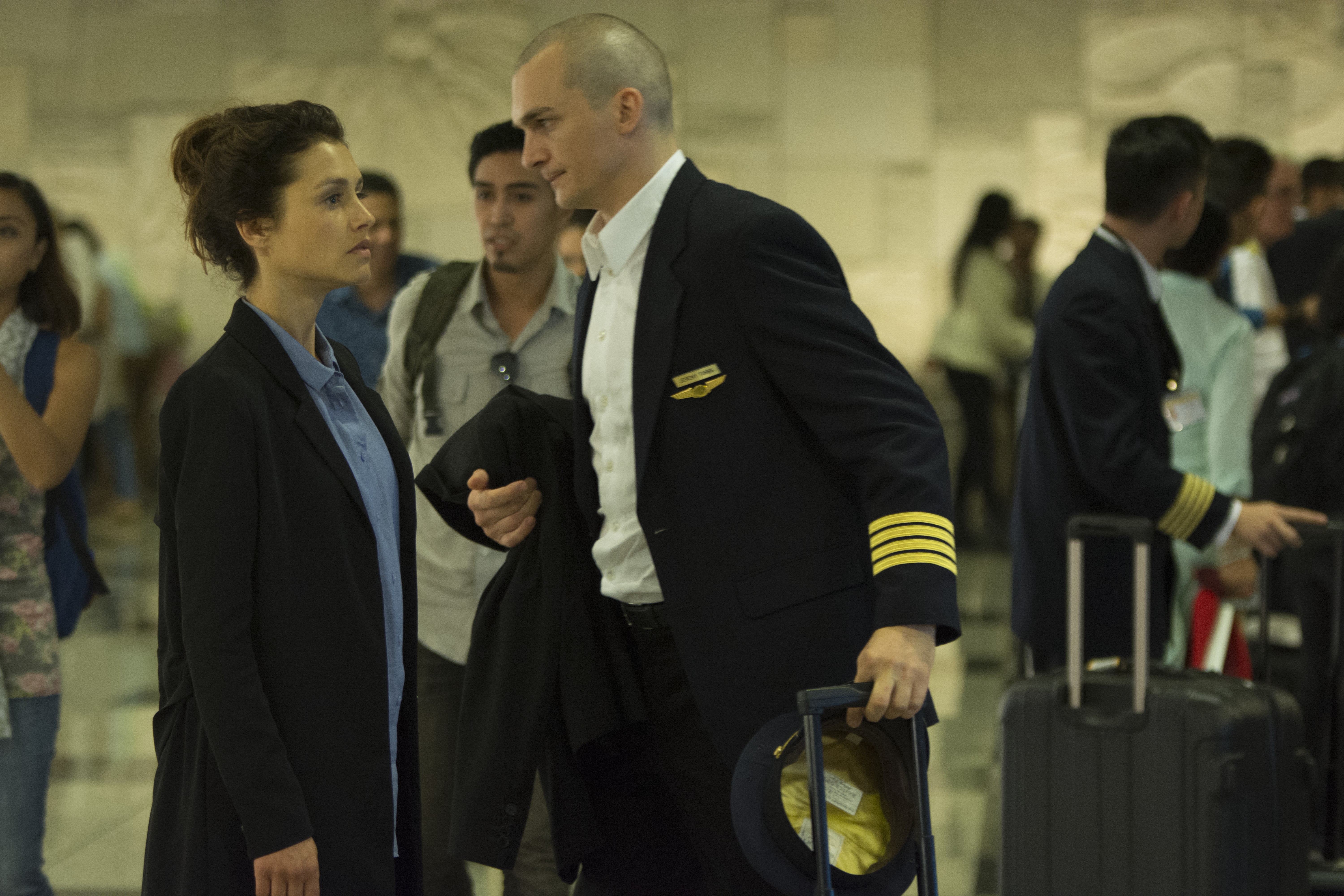 Rupert Friend as a pilot in an airport HD Wallpaper