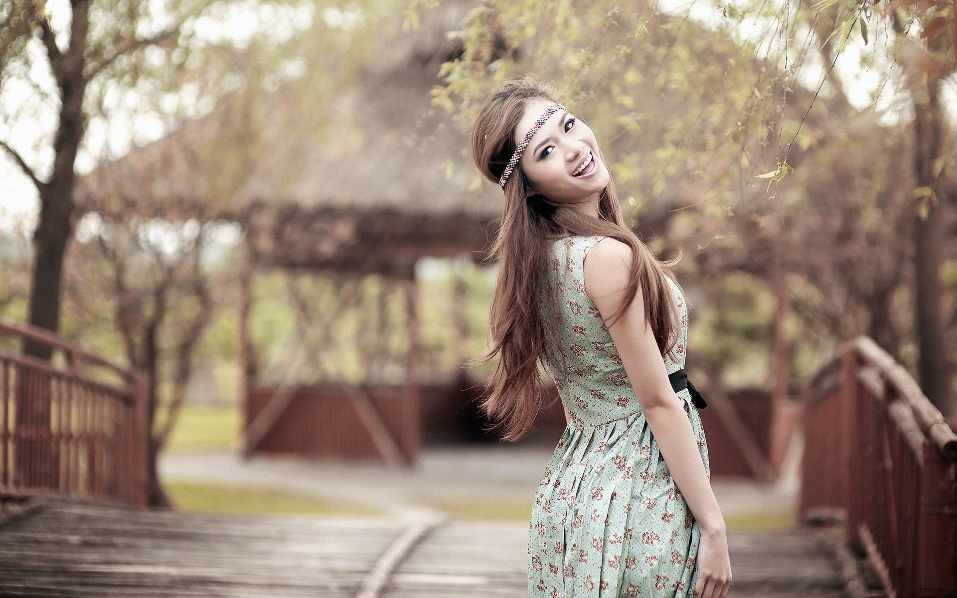 Woman with headband on a bridge HD Wallpaper