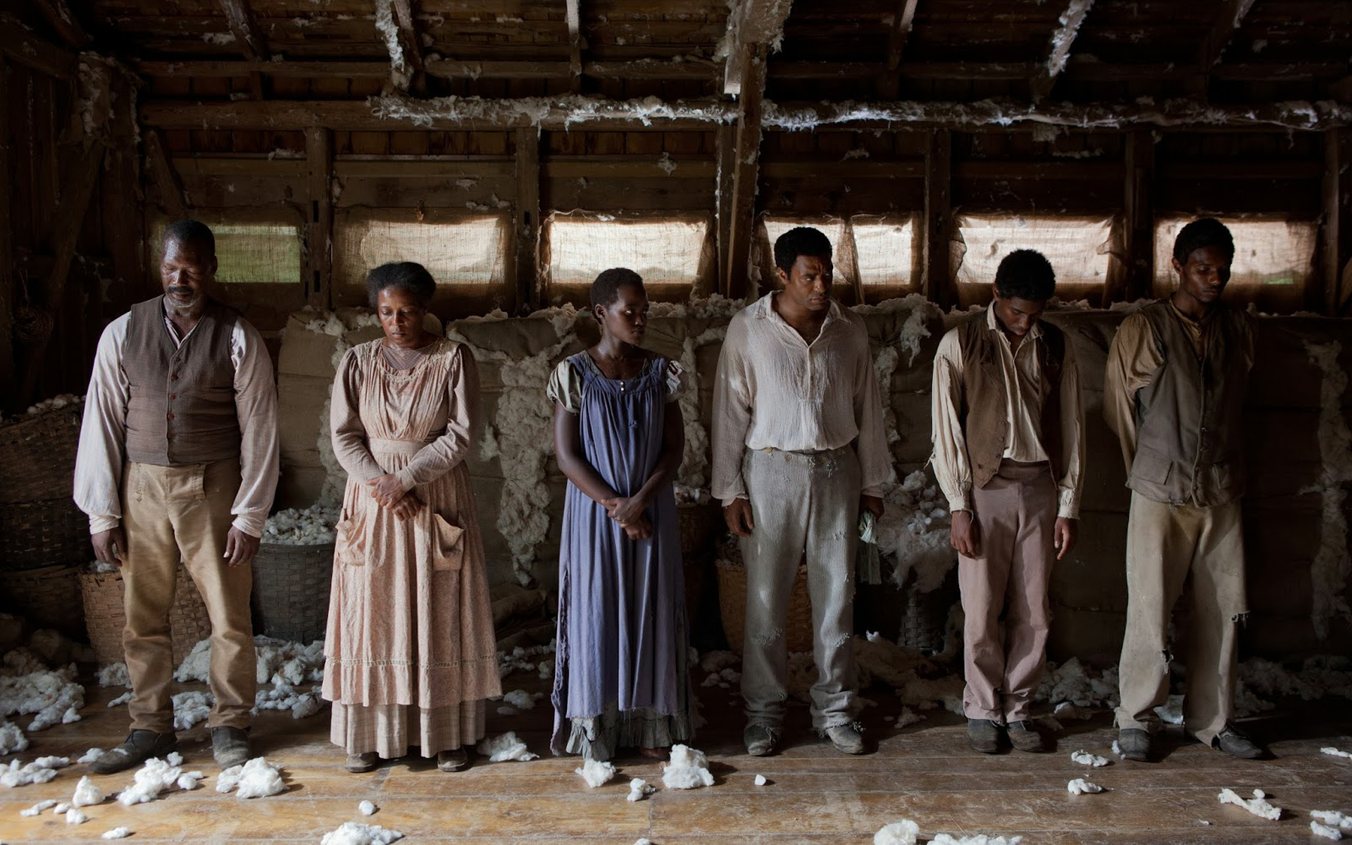 Six enslaved people in a barn HD Wallpaper